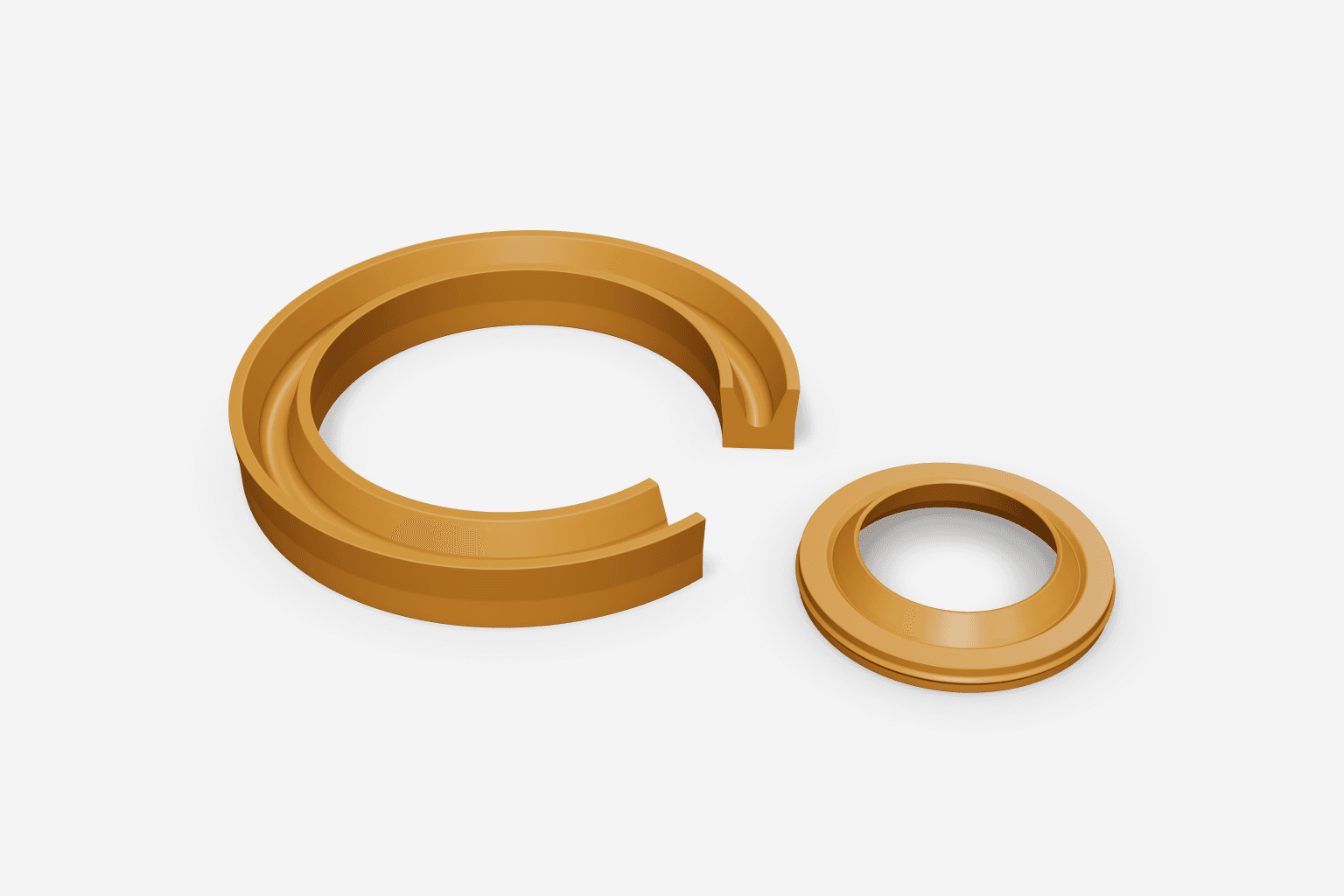 Cutaway 3D render of an amber polyurethane U-cup seal beside a smaller polyurethane ring seal