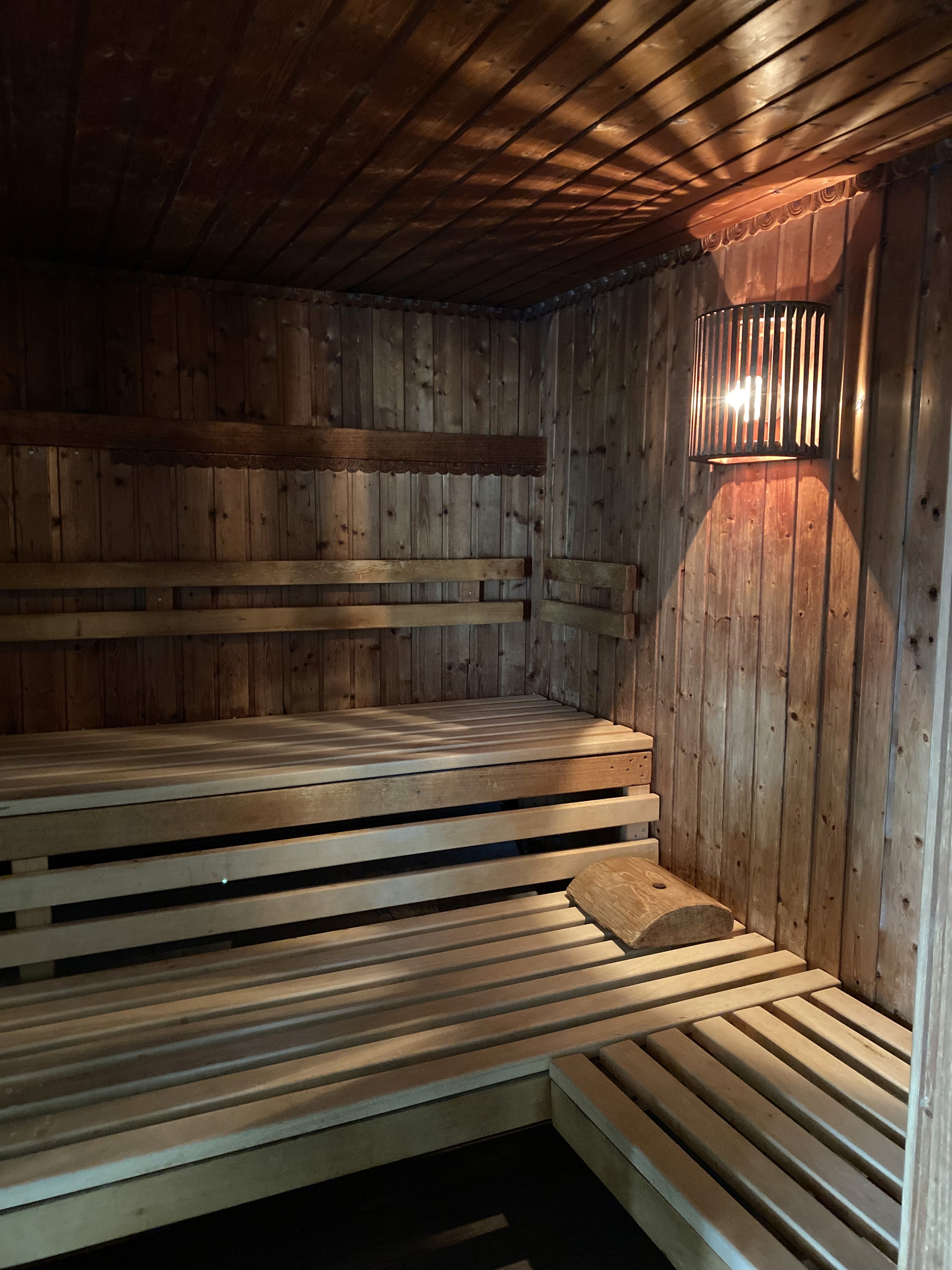 A group of women doing exercises with dumbbells
