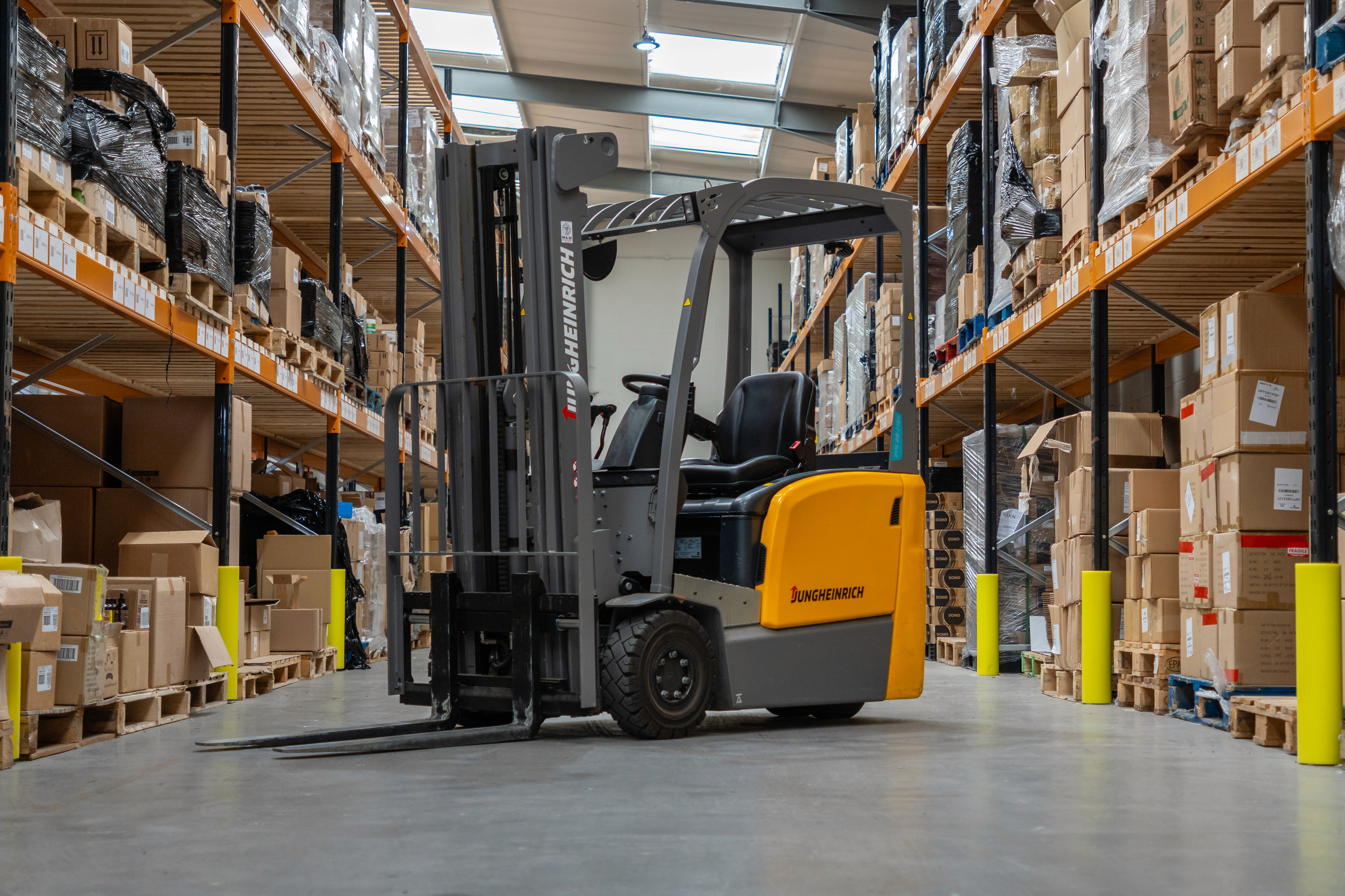 photo of a forklift in a warehouse