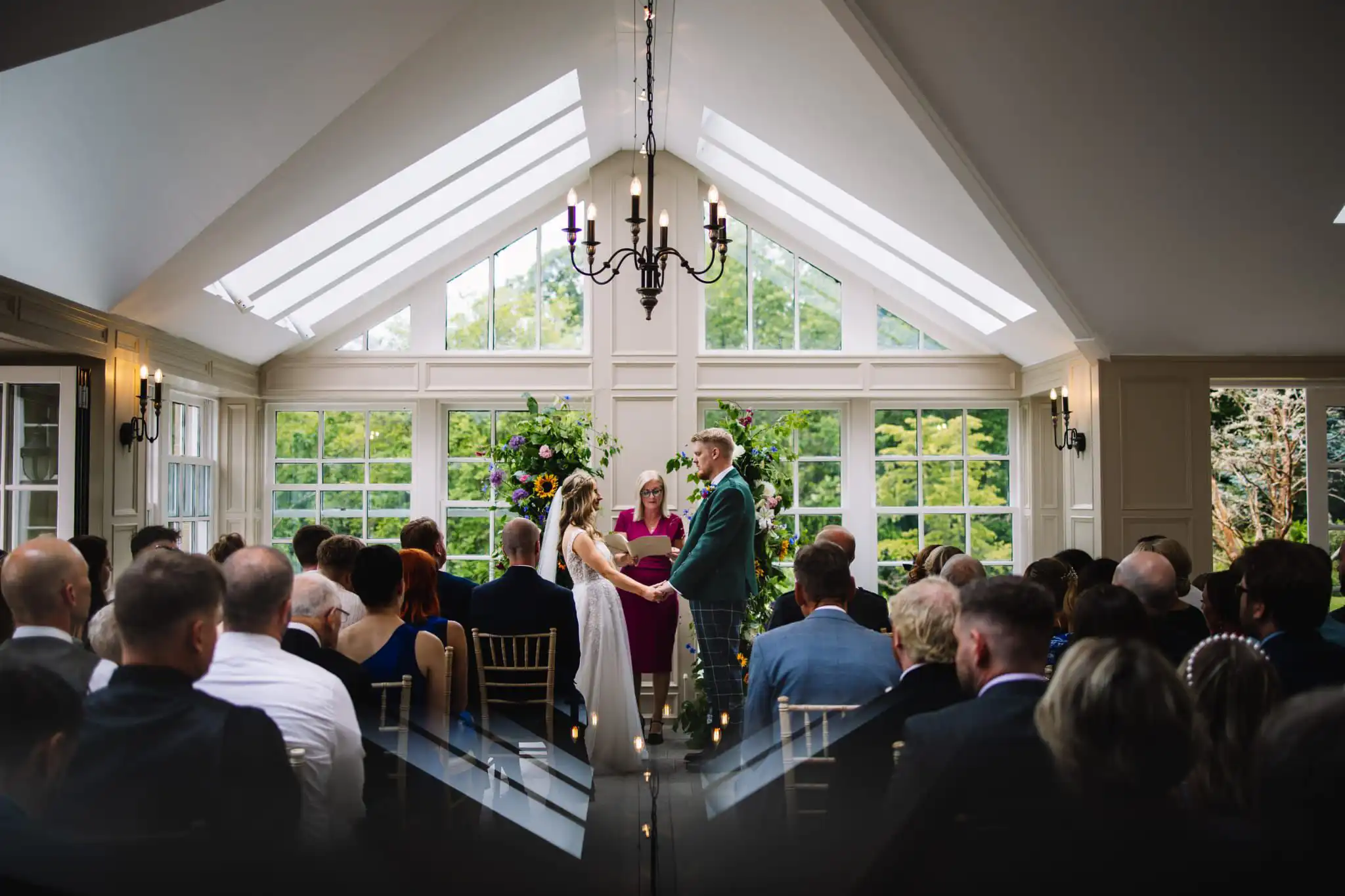 A vintage style truck in a duck egg blue with a collage and the words moon drops on the side.