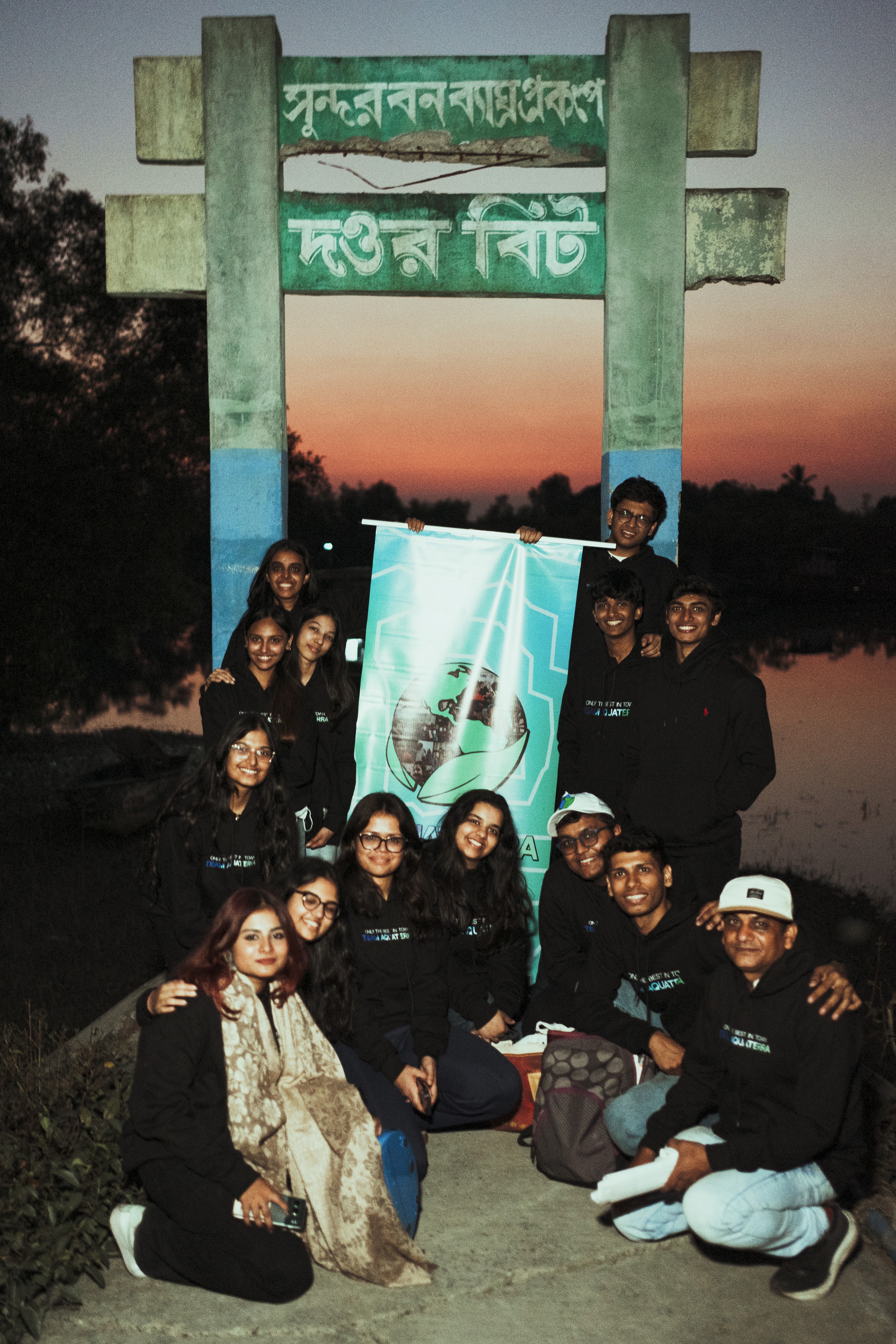 green chairs under umbrellas on shore