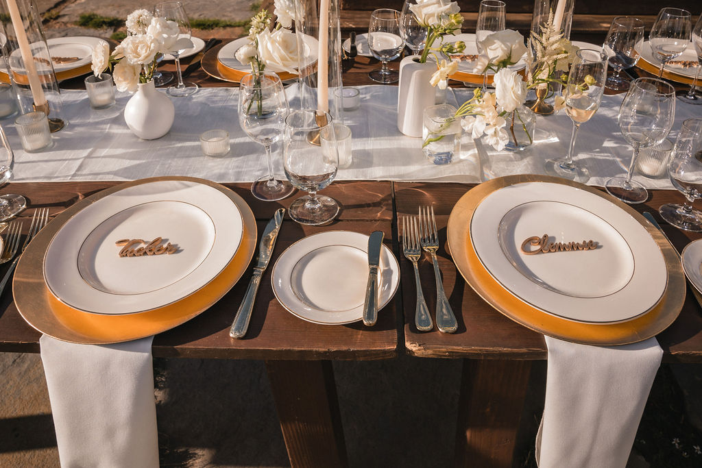 Elegant reception table setting at Smith Cabin Aspen wedding with custom place settings and floral details