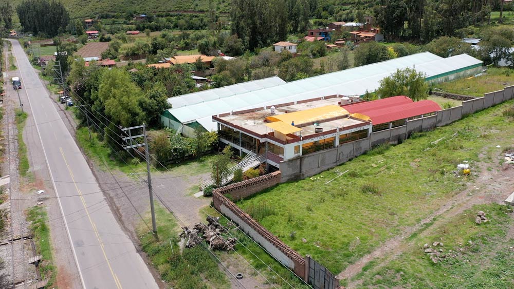 Aerial drone view of Hatuchay Valle Restaurant, a commercial property for sale in Urubamba, Sacred Valley, Cusco, Peru