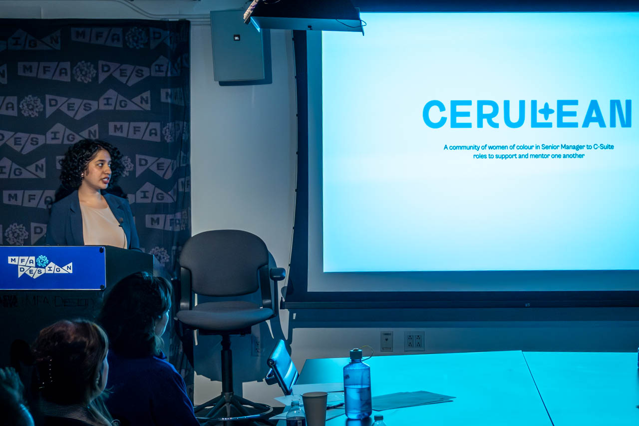 Woman at a podium delivering a presentation