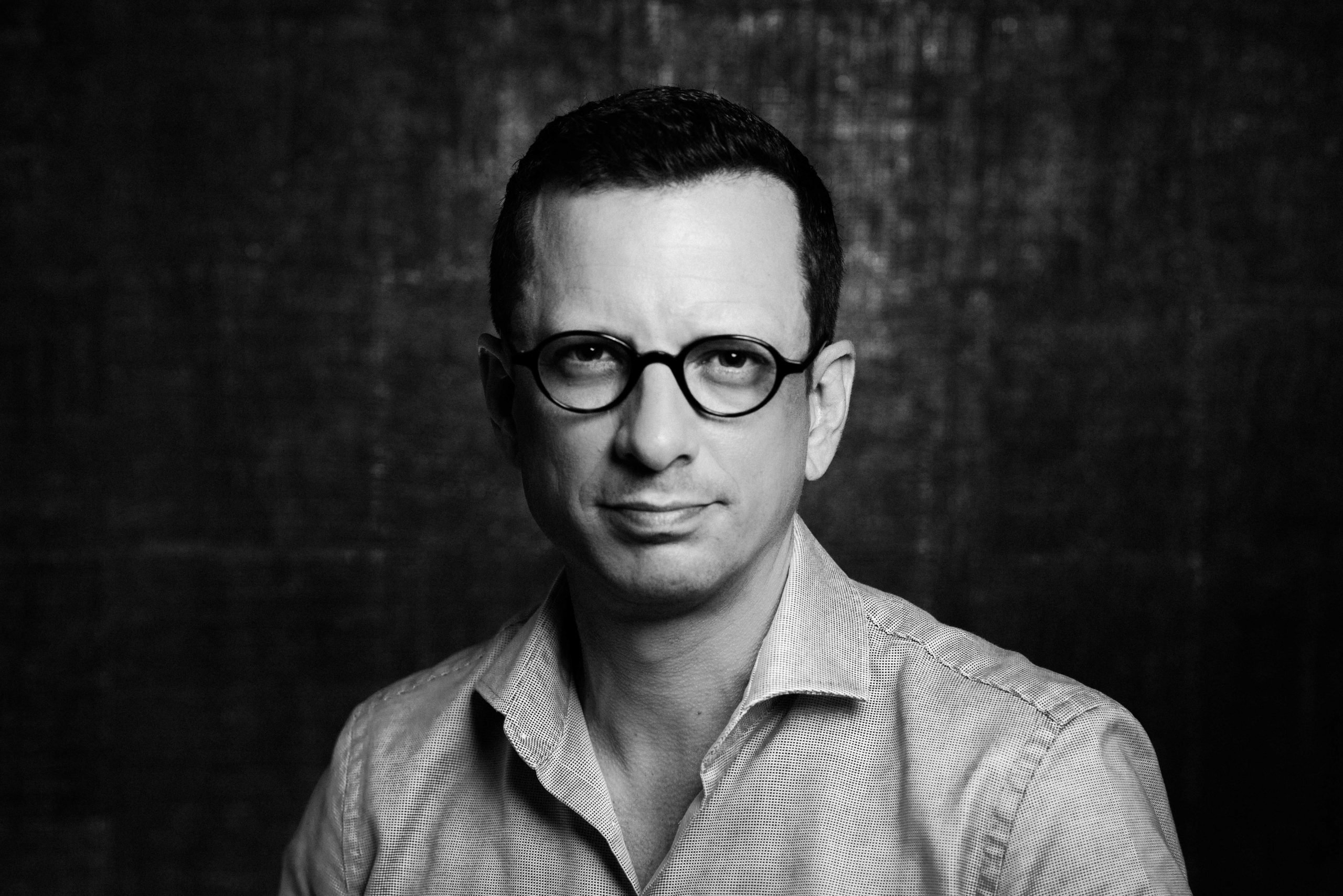 Black-and-white corporate headshot photographed on location in Amsterdam