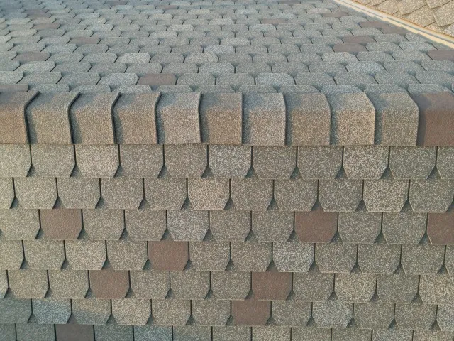 High-resolution close-up of textured F-Wave synthetic shingles installed by Highland Park roofing company Arrington Roofing