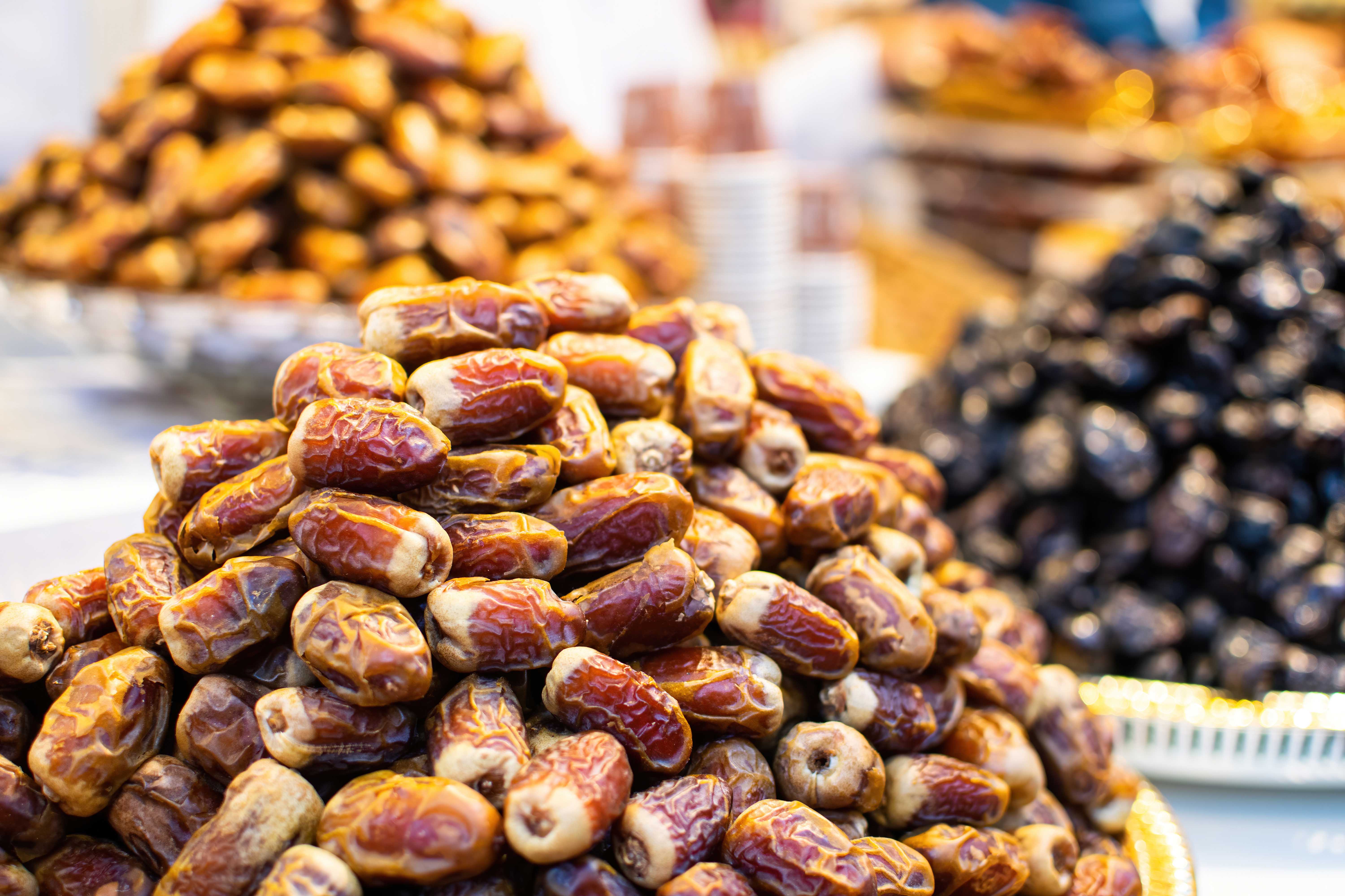 Dubai market display of assorted dates, popular souvenir.