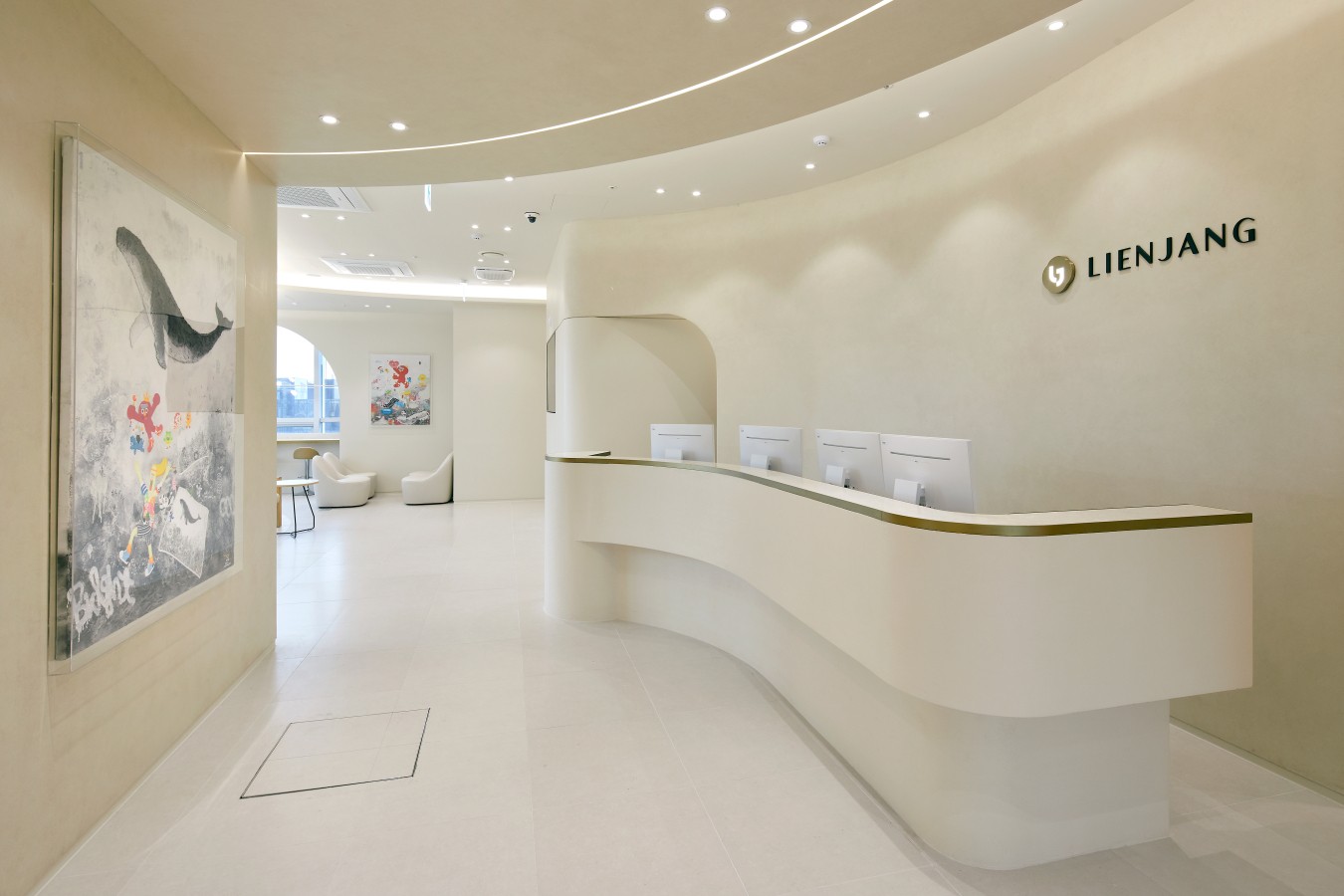 brown and white concrete building under blue sky during daytime