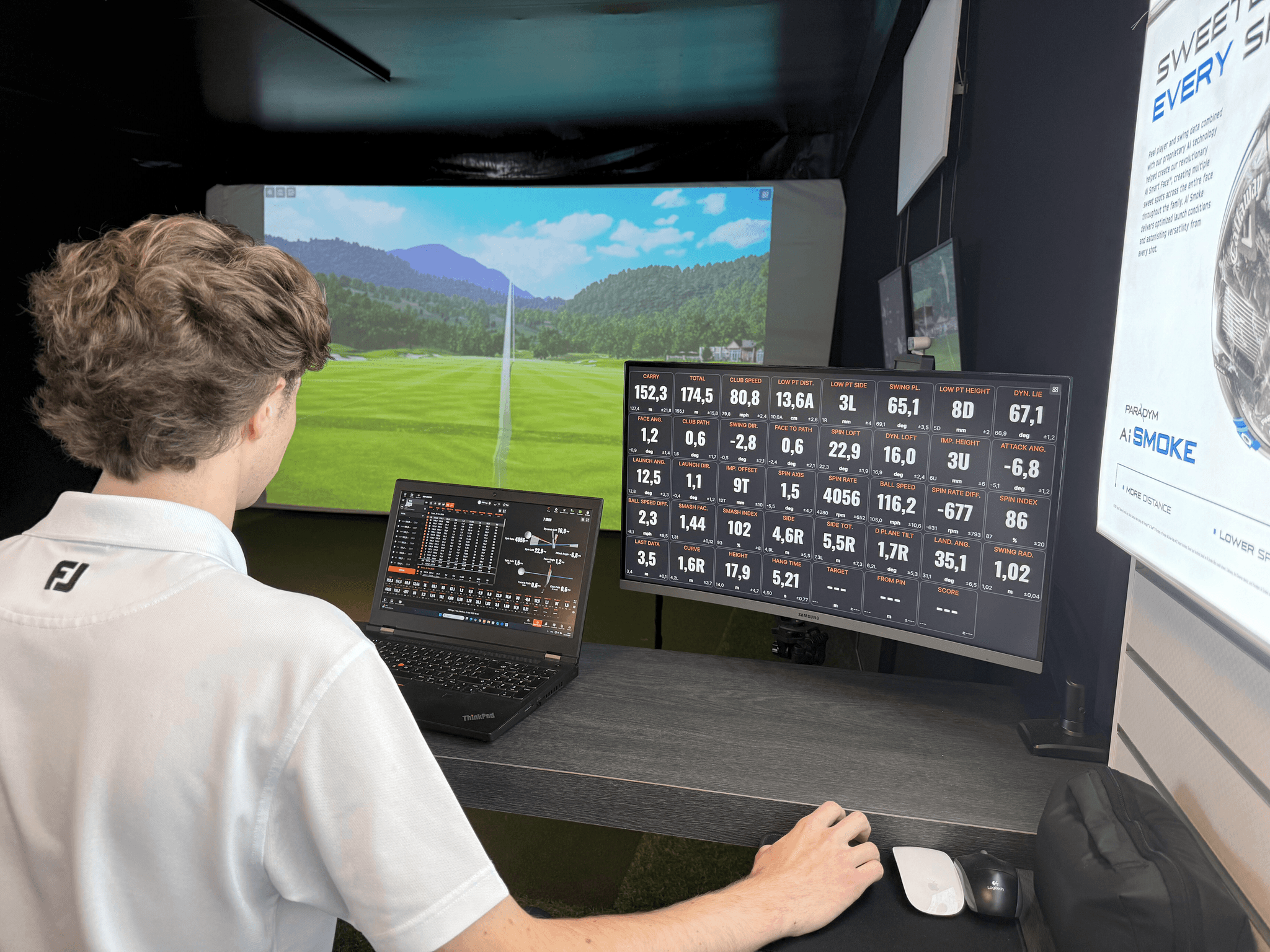 A coach reading numbers from an ipad