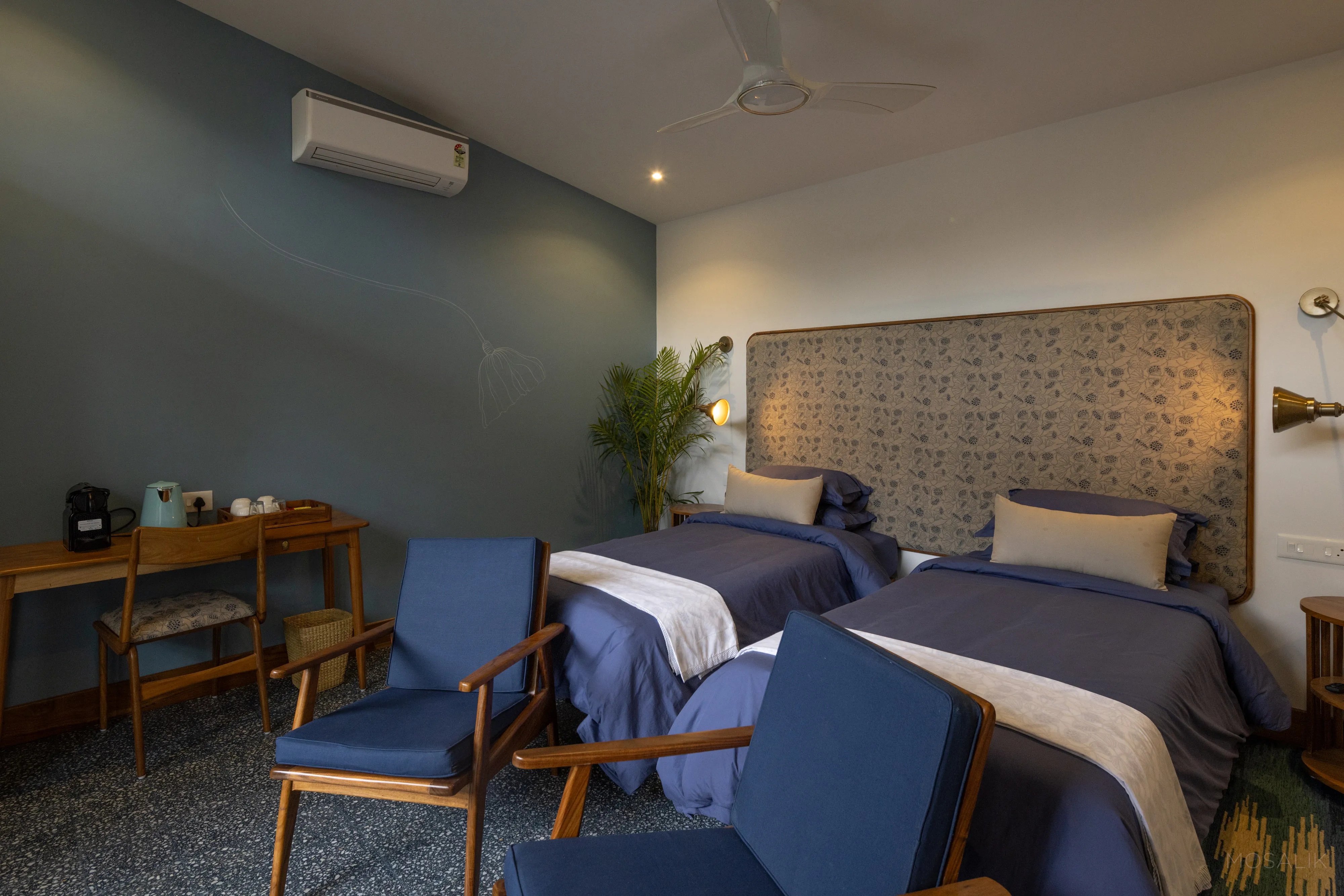Twin beds with a jaali-print headboard at Jaali Blue