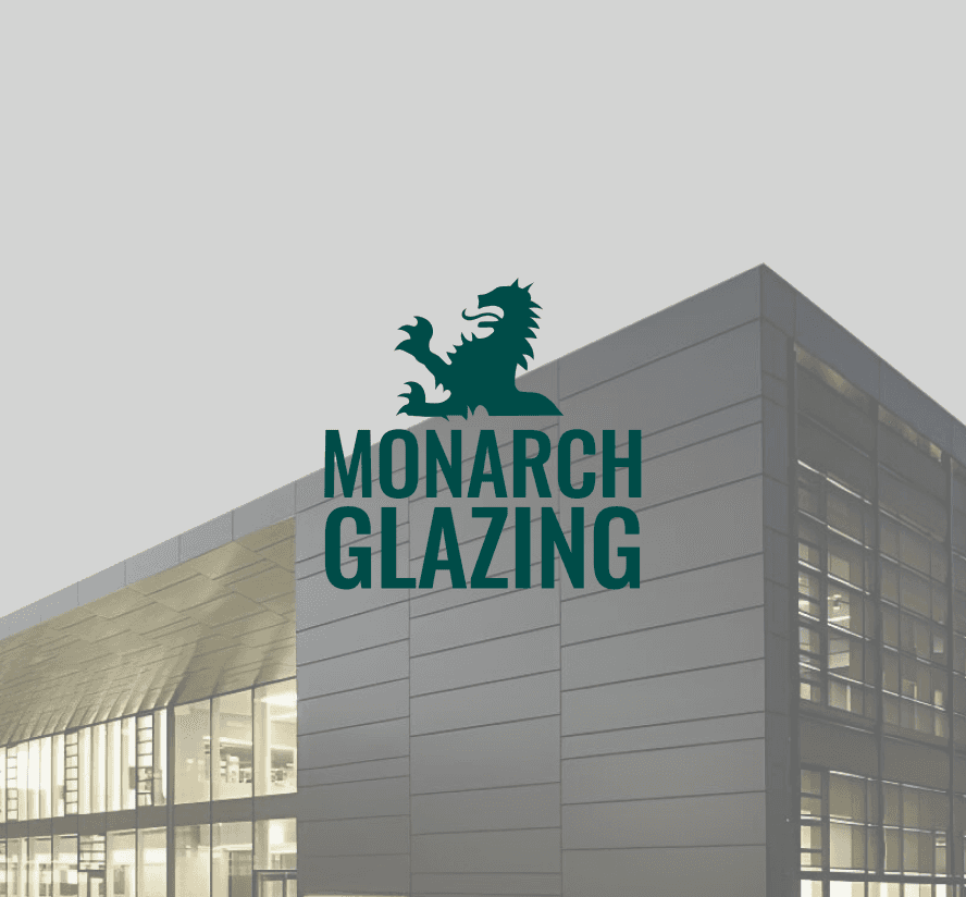 monarch glazing logo over image of building with metal siding