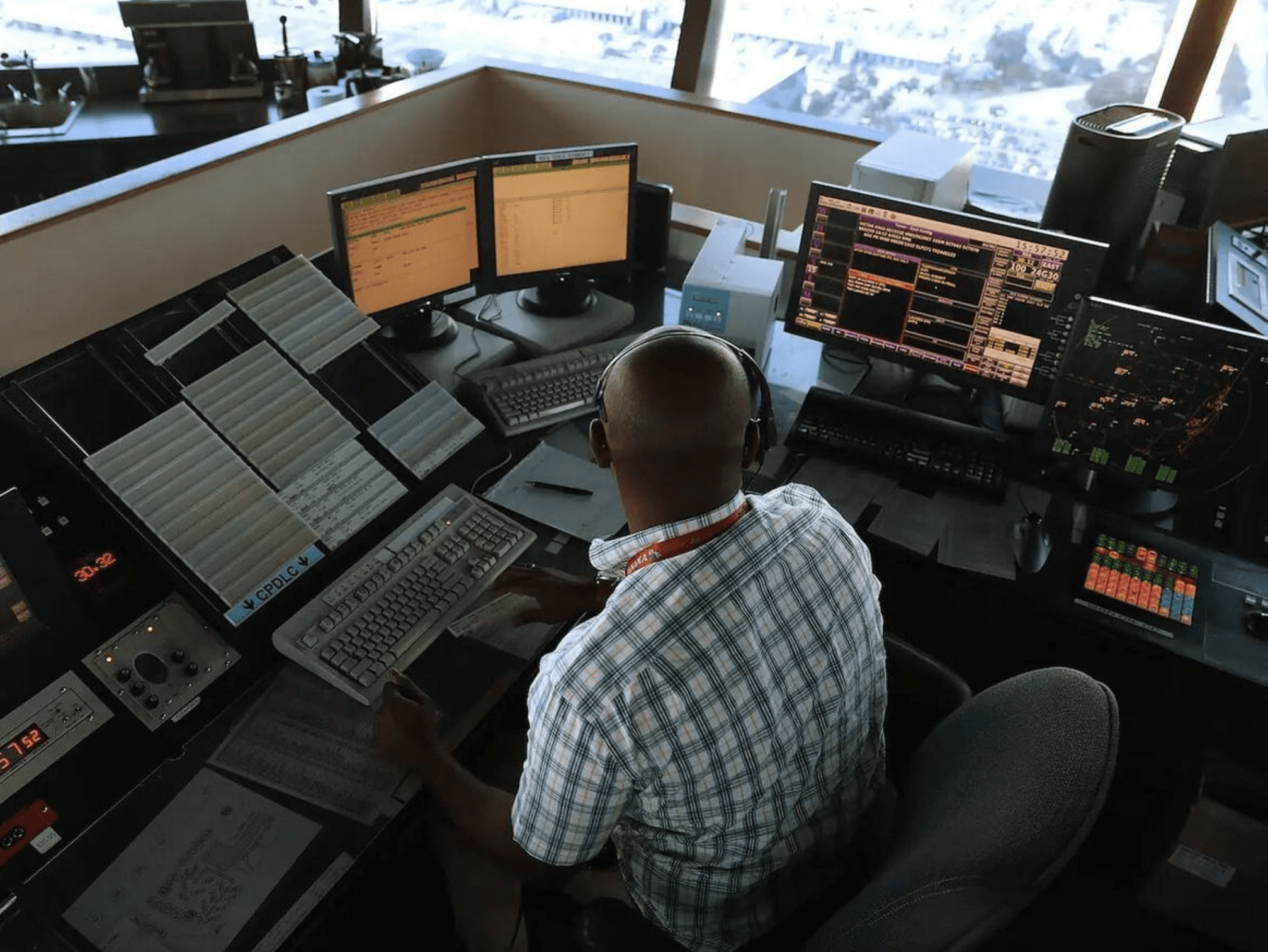 A myriad of antiquated interfaces, tools, and analog systems are used to coordinate flight operations. Courtesy of Joe Raedle/Getty Images