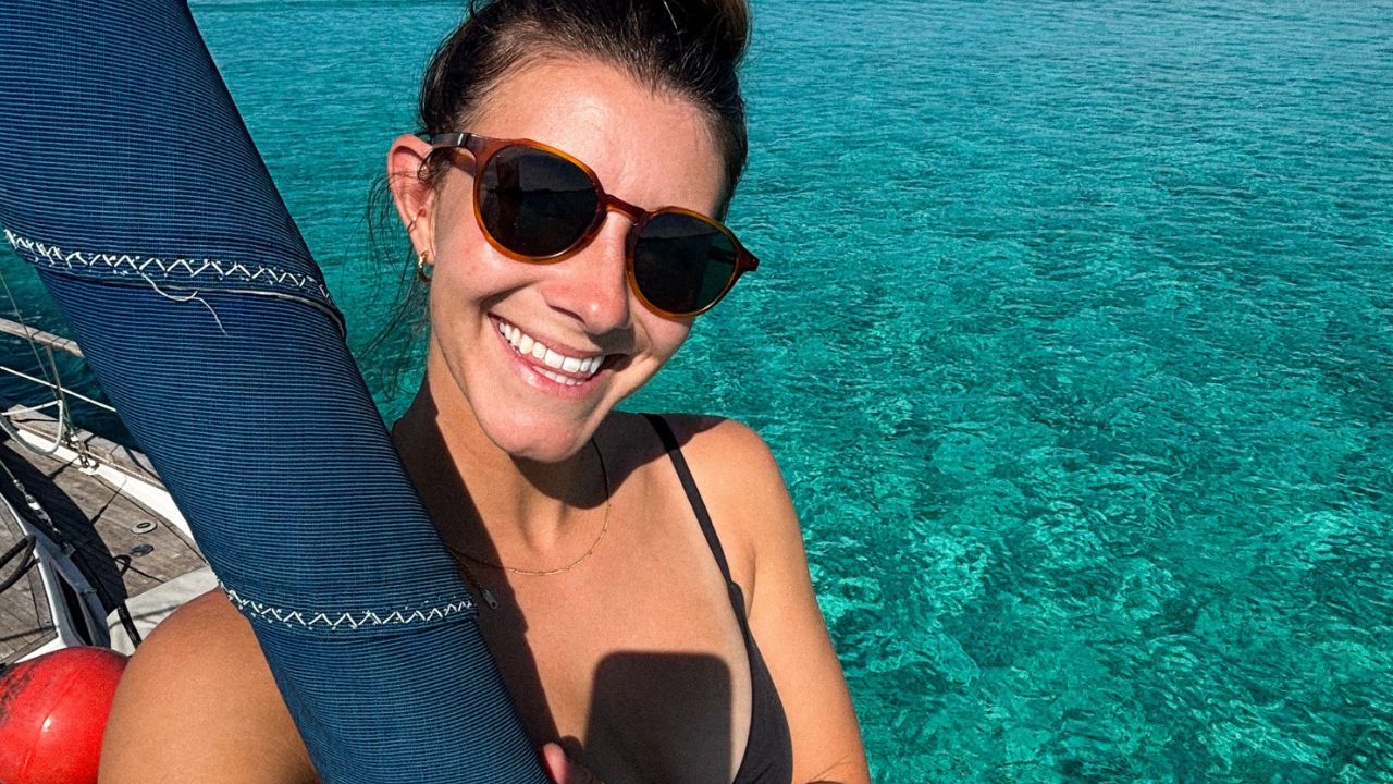 Haley from Cruisincasa on her sailboat