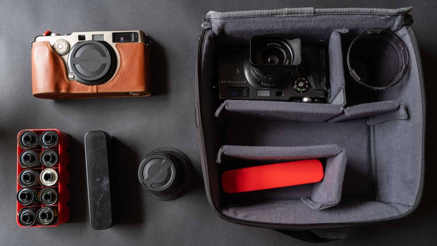 My entire travel bag laid out as a to go film kit for travel photography