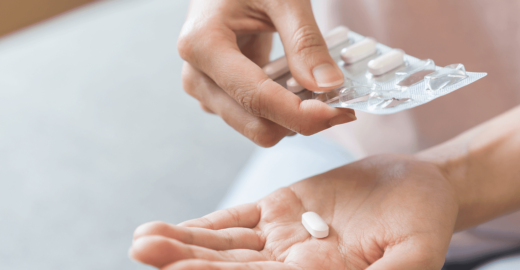 Hands with pills