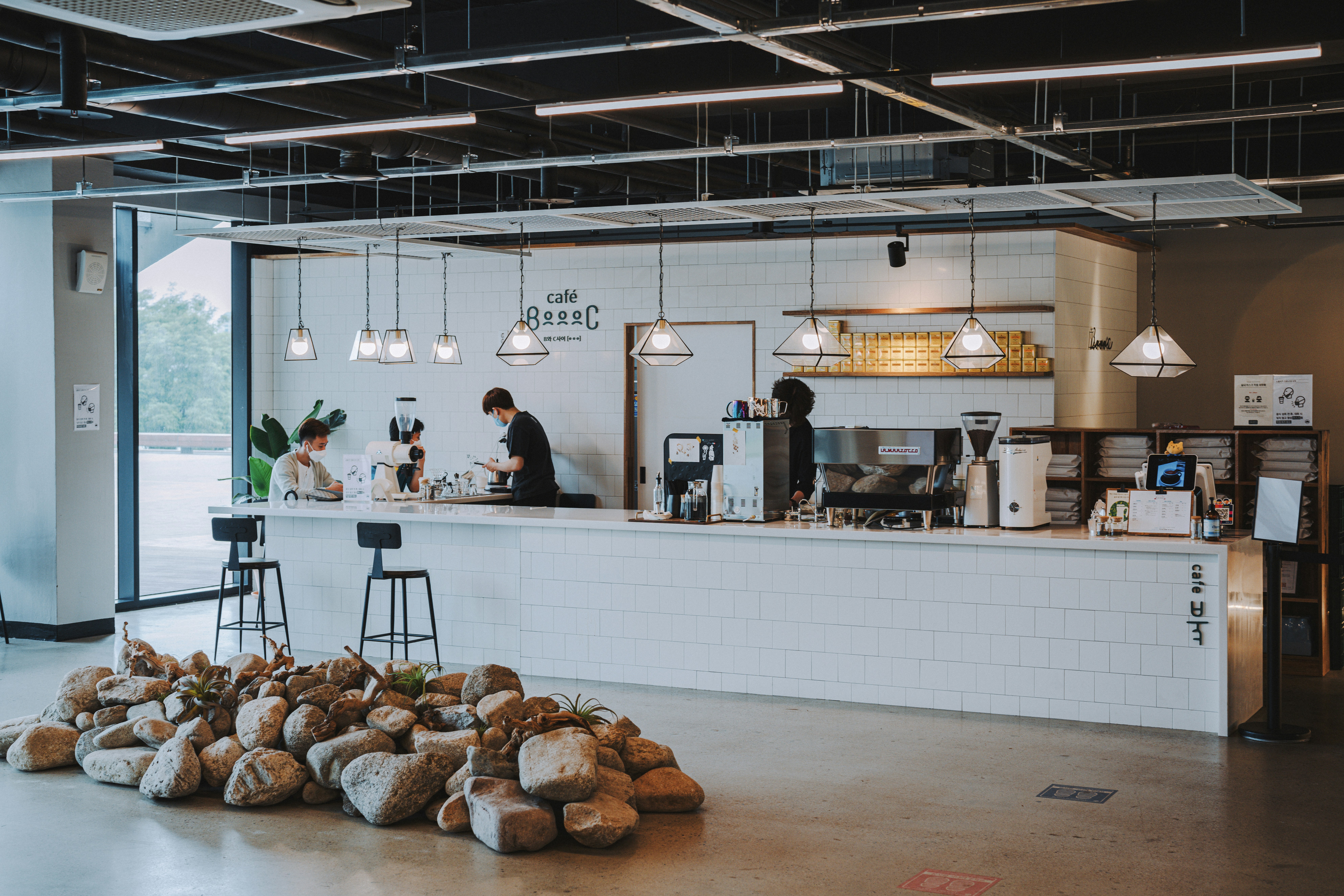 people standing in front of food counter