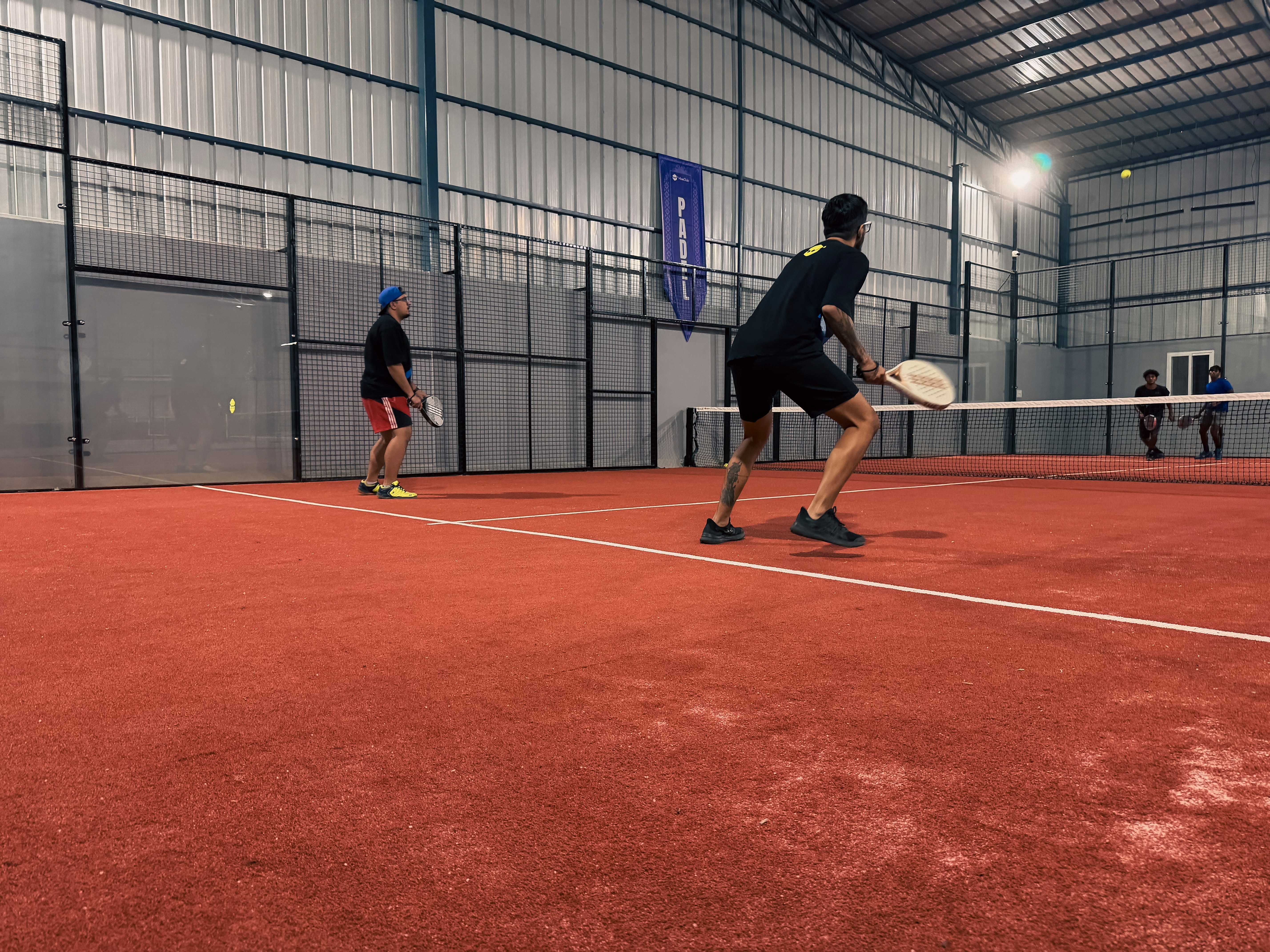 Drone shot of a running track at night
