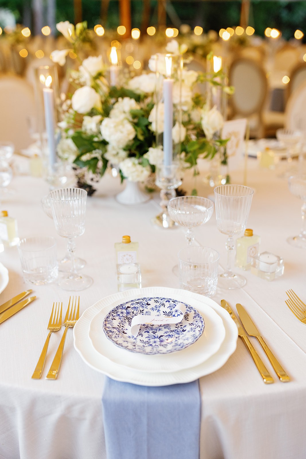 Plates and and cutlery for a table setting at a premium wedding