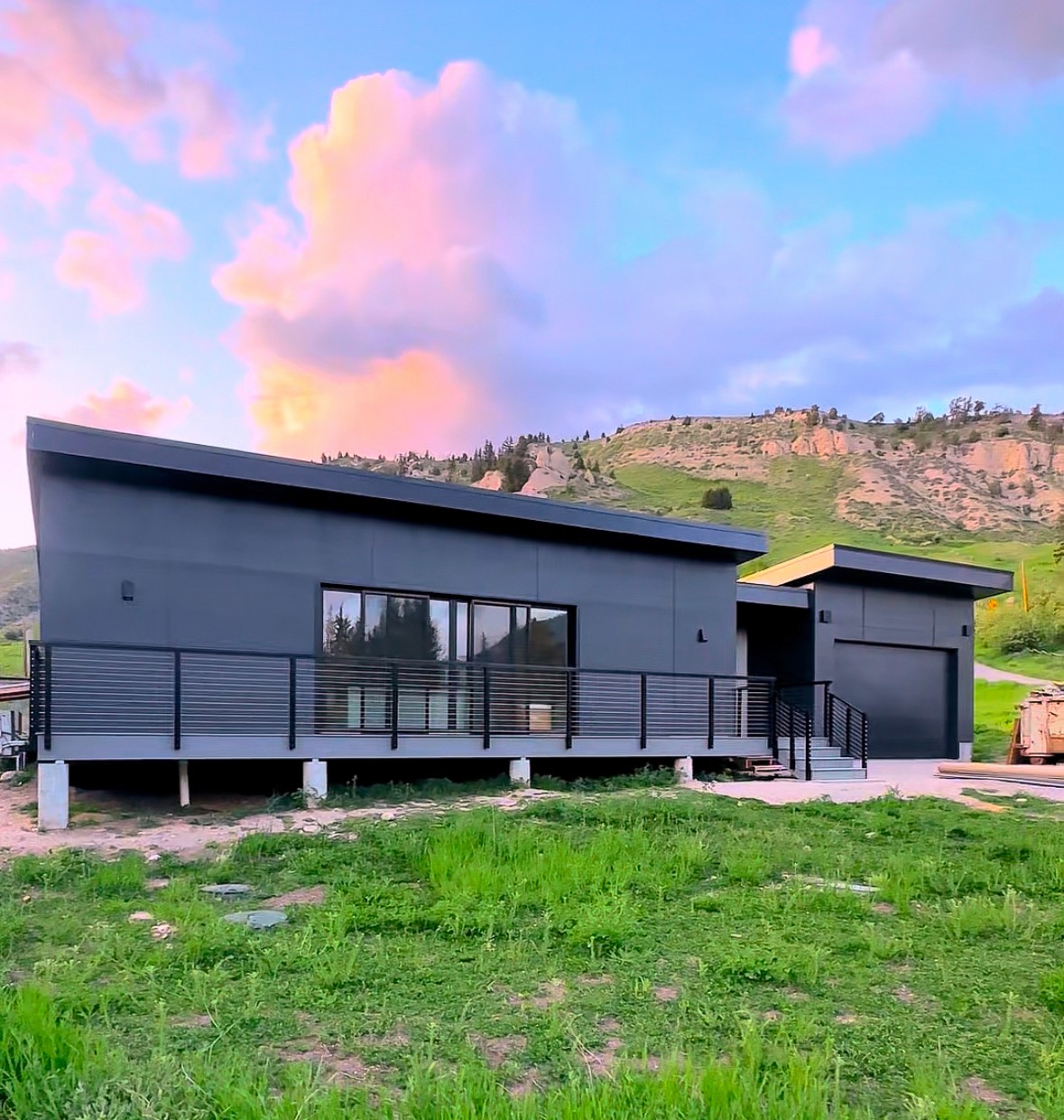 A modular home in Jackson Wyoming at dusk.