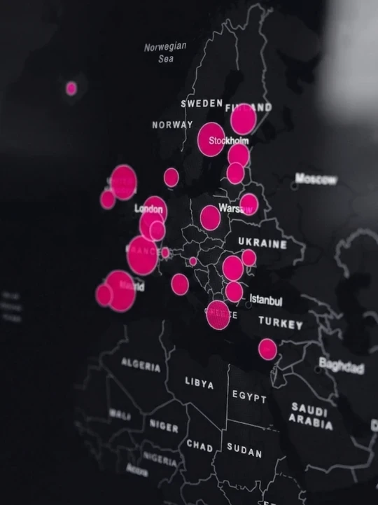 Dark map of Europe and parts of Africa, highlighting cities with bright pink circles. Cities like London, Stockholm, and Ankara are marked prominently.