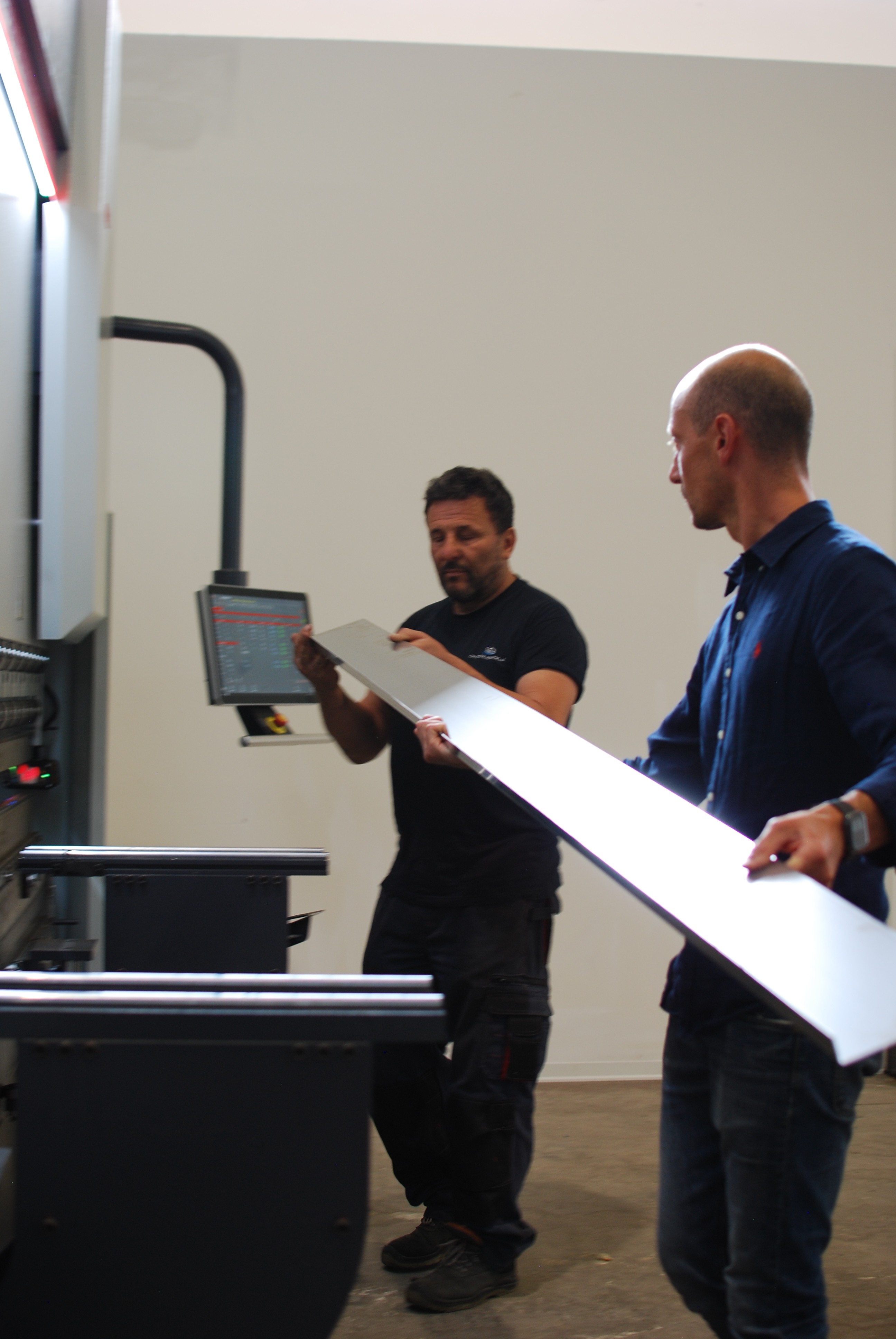 Welding sparks illuminate the darkness.