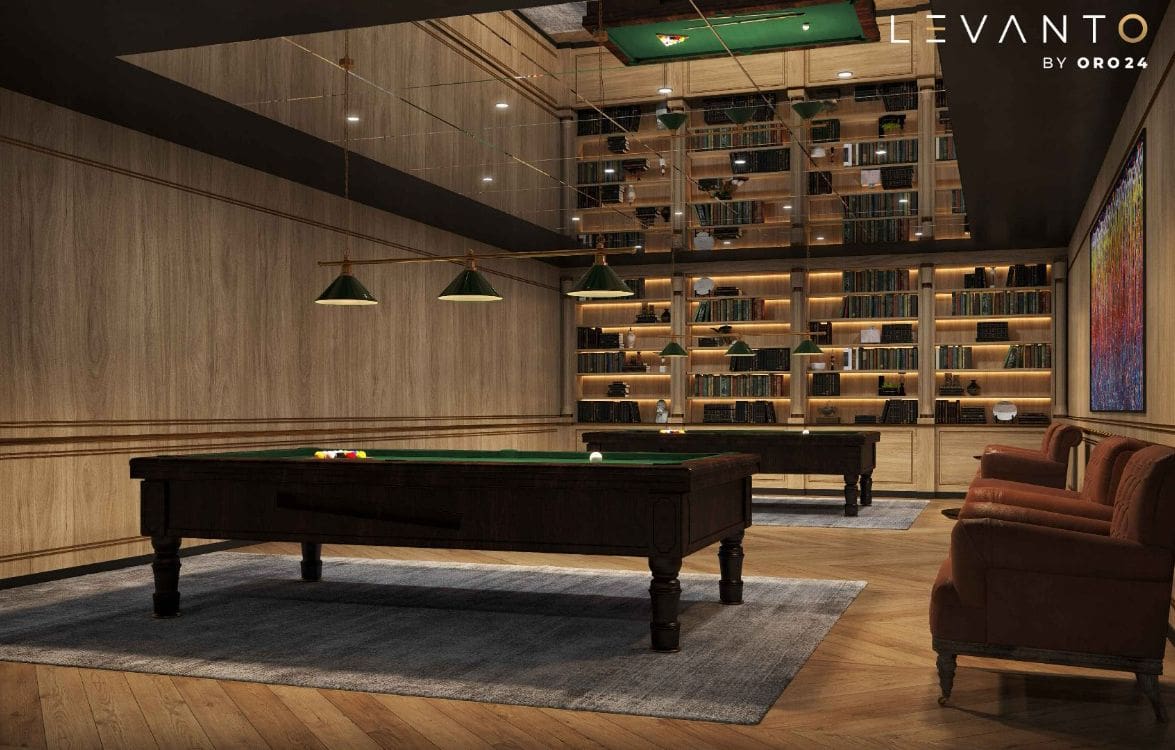 A billiard table in a room featuring a bookshelf, designed by Levanto for ORO24.