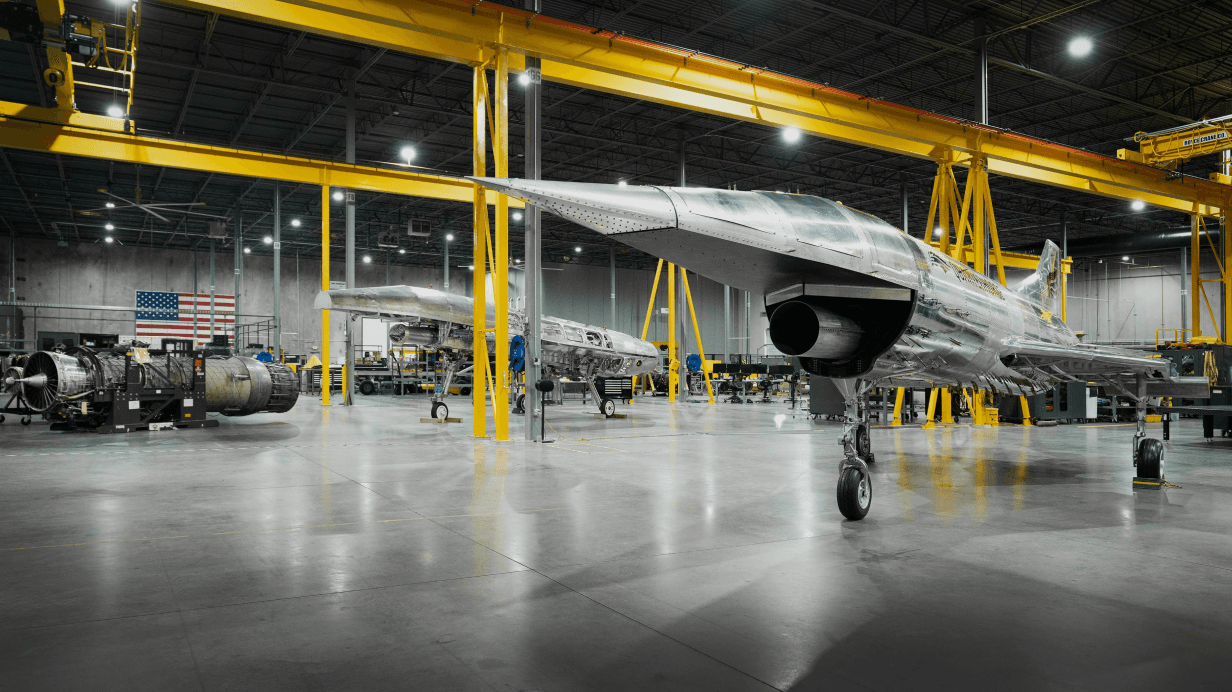 A hangar with two planes