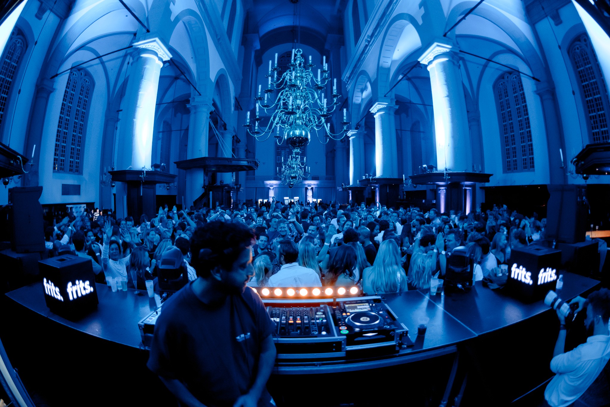 Streetside billboard with flyposters of the Batch.Works brand and illustrations