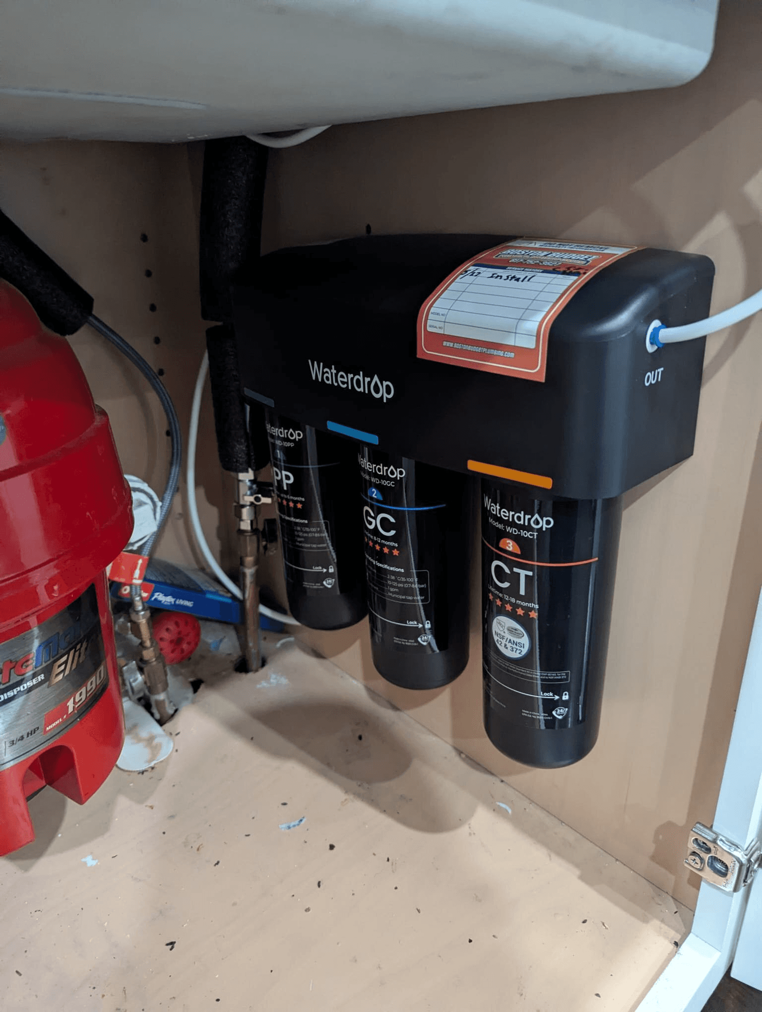 a row of water tanks sitting next to each other