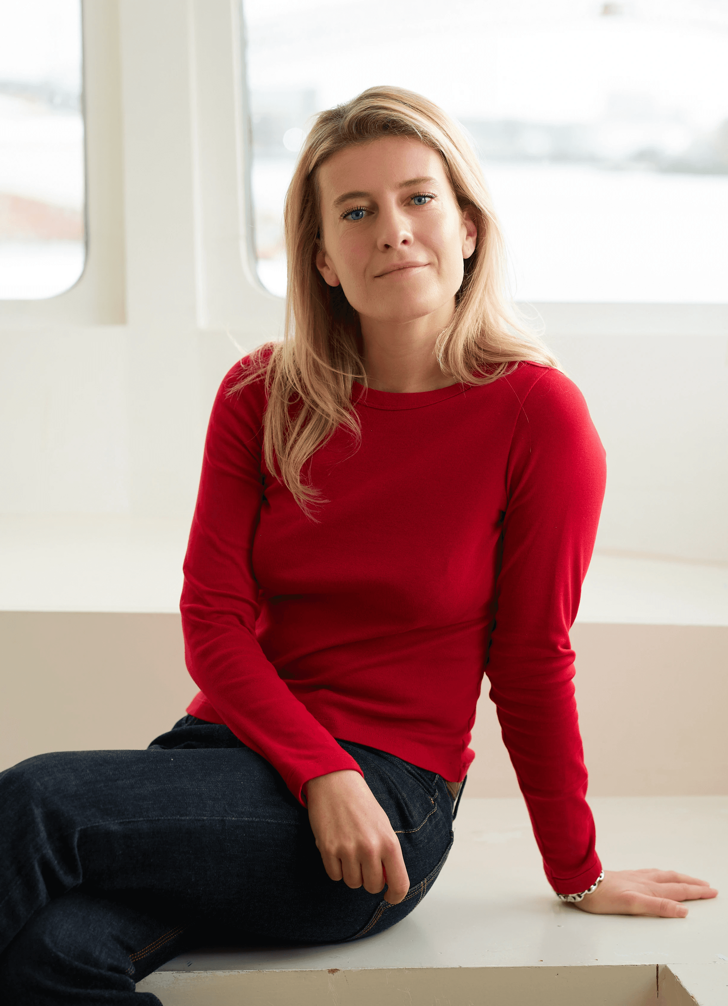 Professional woman smiling in a suit