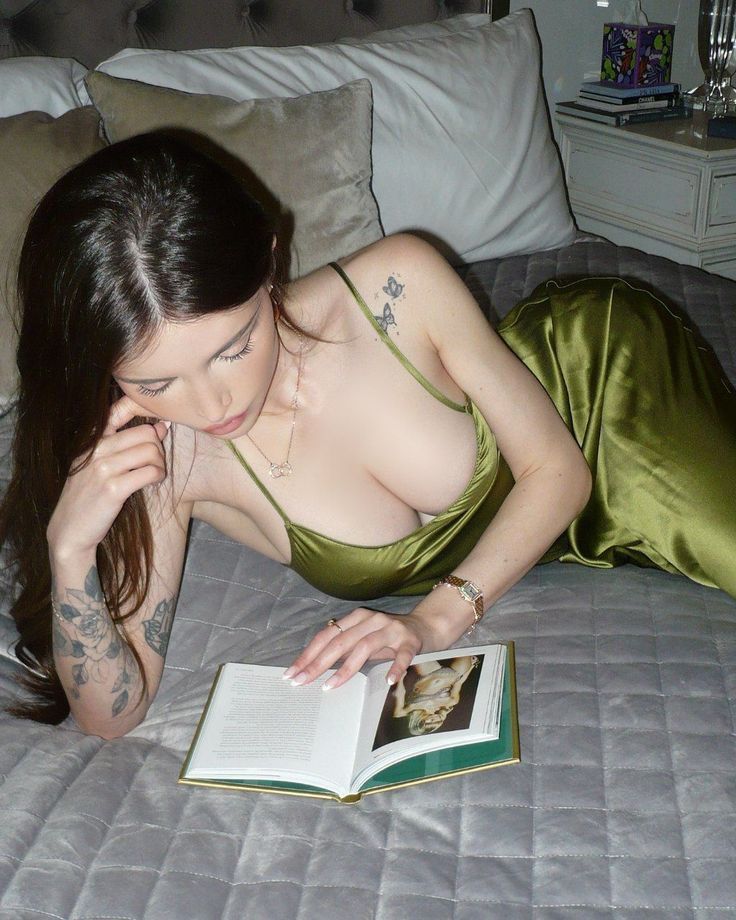 kids lying on a glass land and smiling