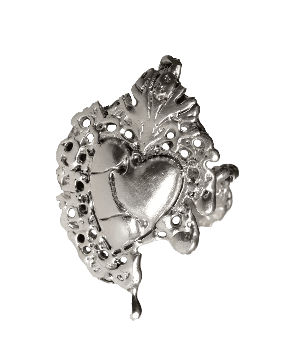 silver ring with heart motive