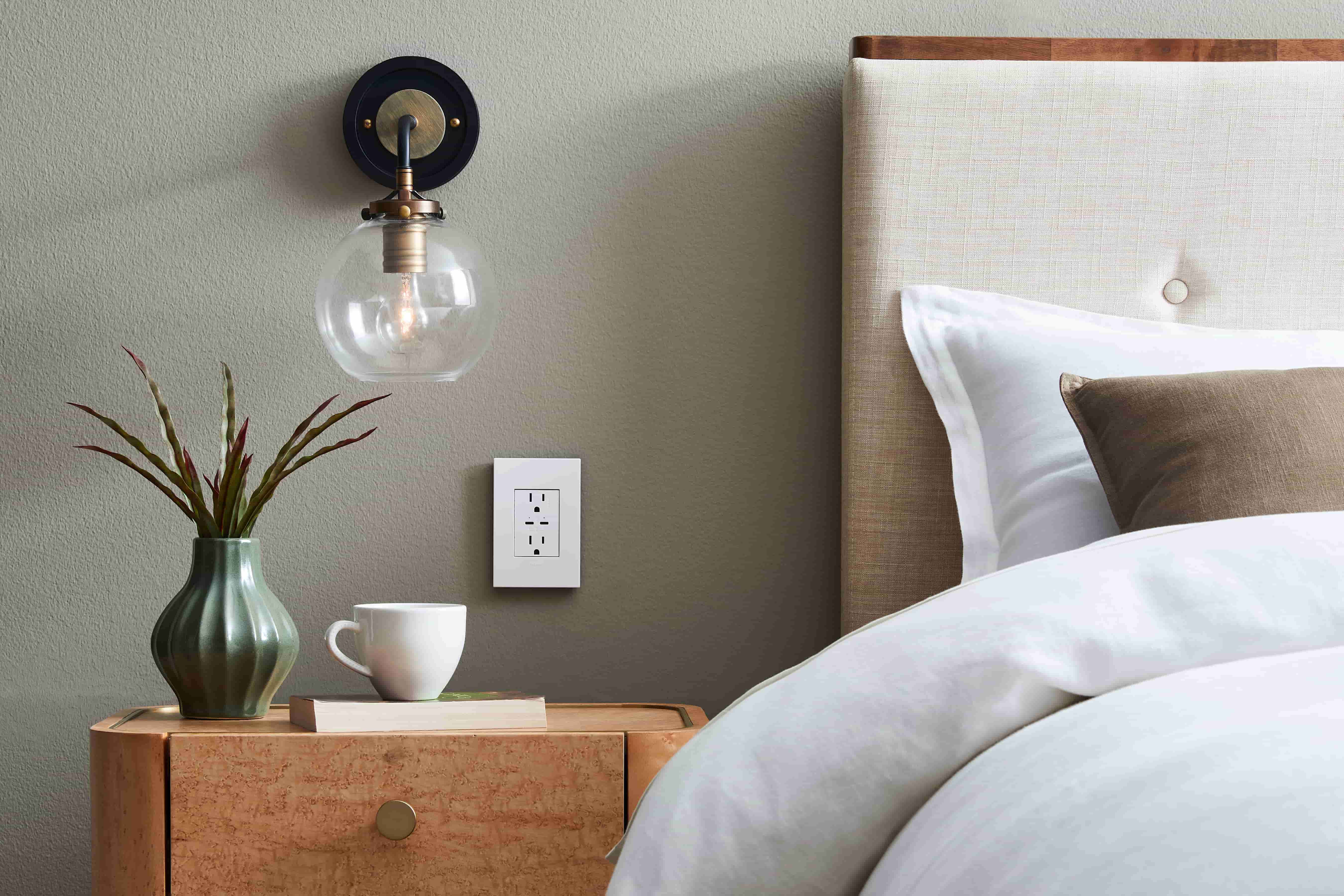 Legrand Pass and Seymour decorator outlet and wall plate installed in residential bedroom in British Columbia