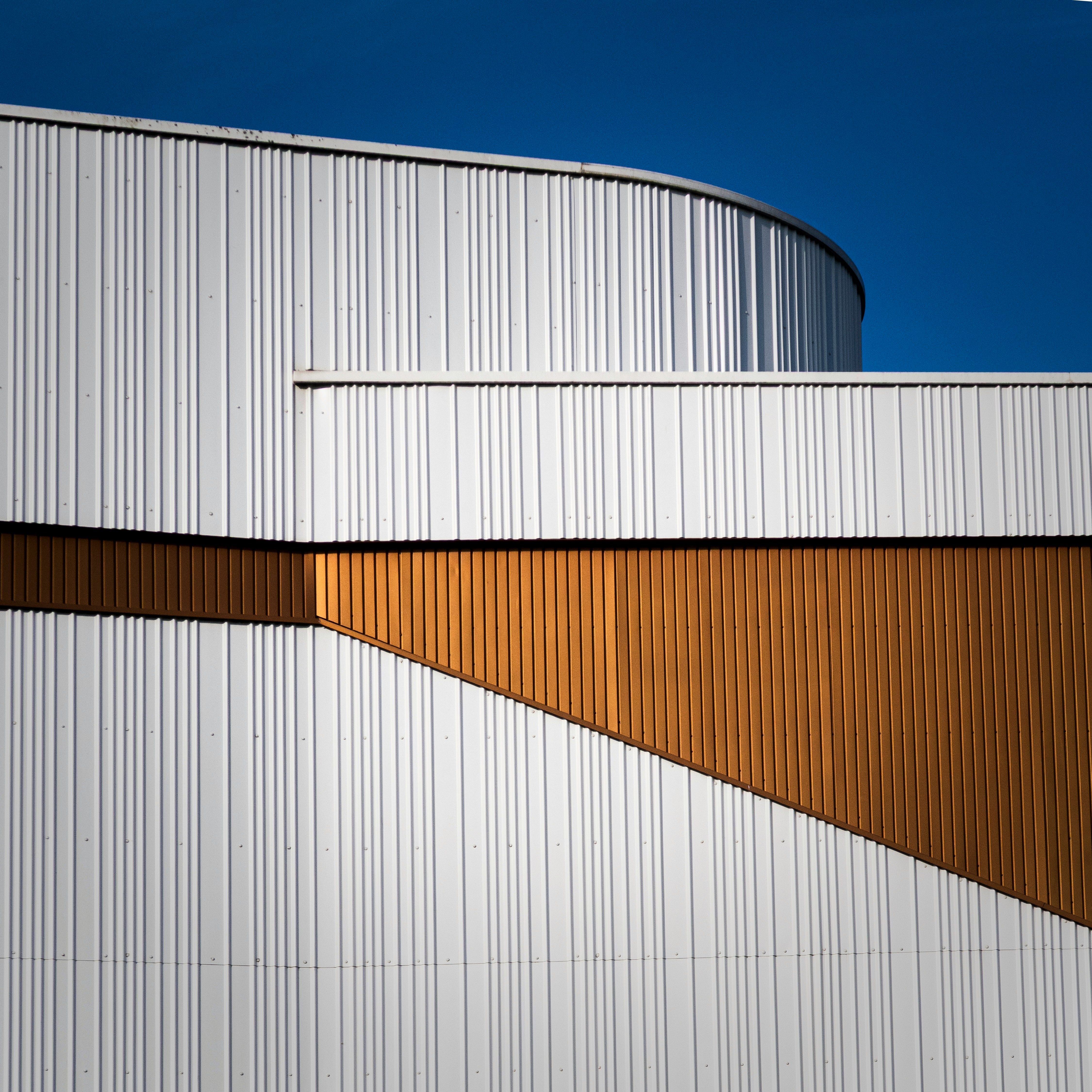 Modern architecture with geometric shapes and contrasting colors.