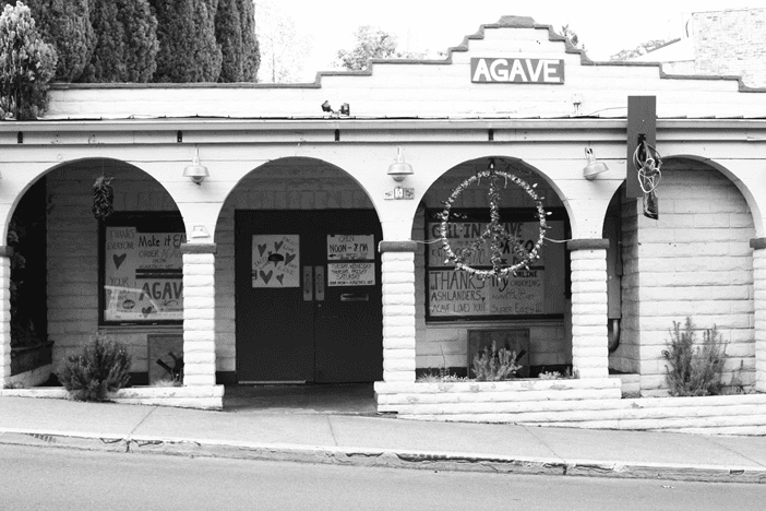 Agave restaurant storefront with arched entryway