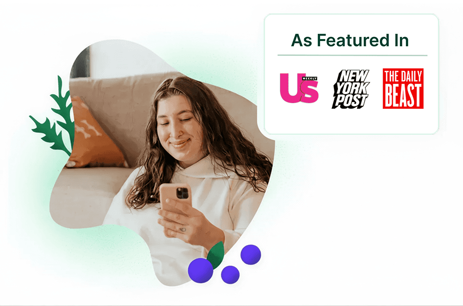 Woman smiling at her phone learning her nutrition therapy is covered by insurance