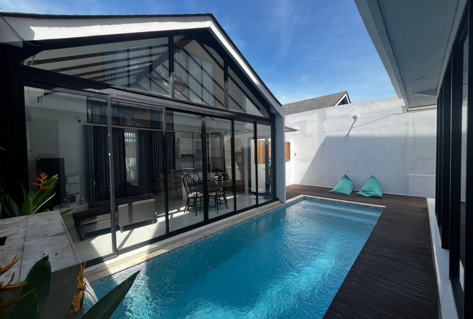 Modern architecture and pool view. Nyanyi Beach real estate agent specializing in contemporary Bali homes.