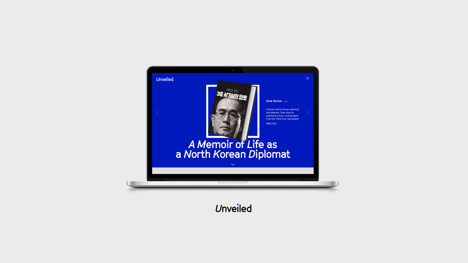 A laptop screen displays a blue webpage titled “Unveiled” with the subtitle “A Memoir of Life as a North Korean Diplomat.” A book cover image shows a man with glasses and a dark jacket, partially obscured by text. The text includes Korean and English phrases. The laptop is positioned on a light gray background. Below the laptop, the word “Unveiled” is displayed in black text.