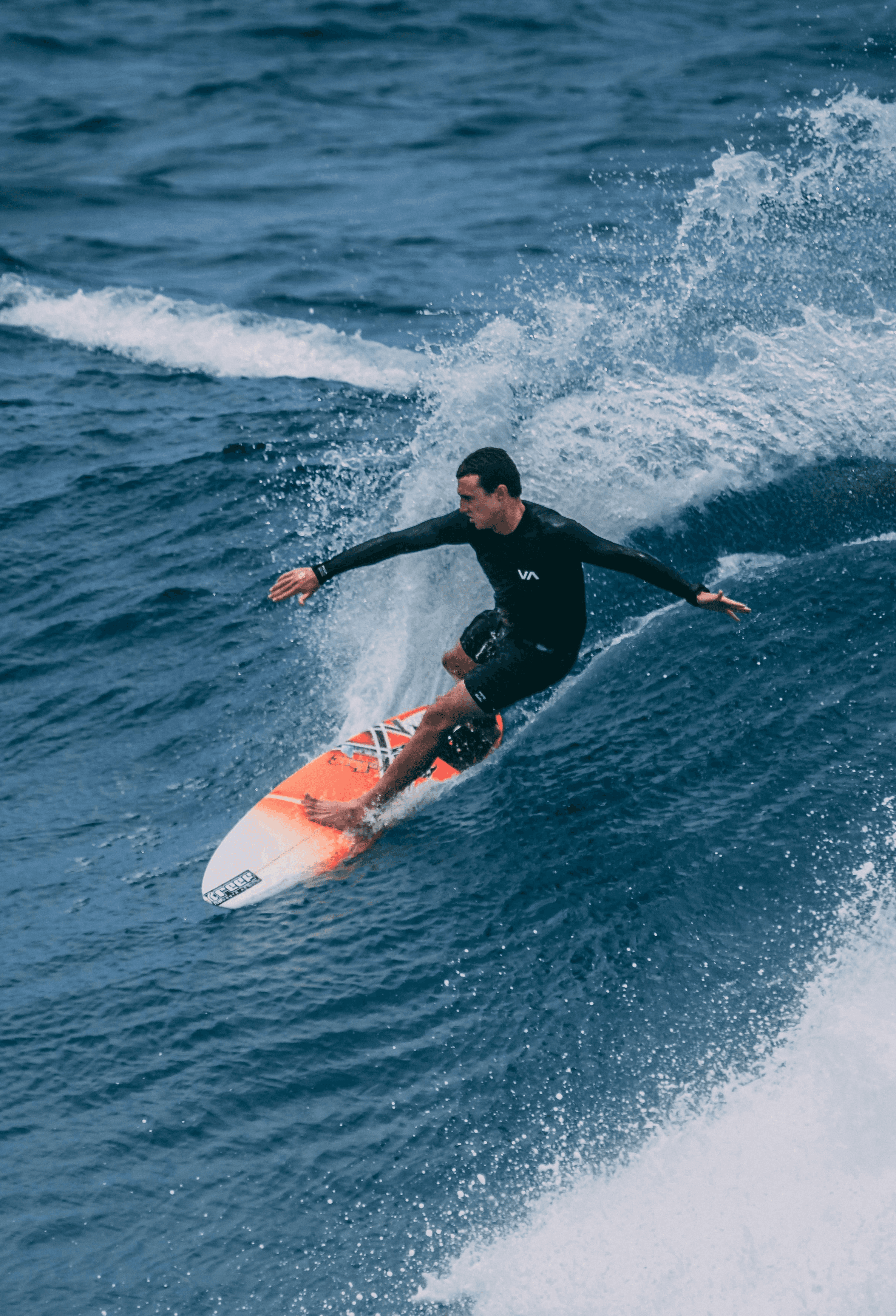 man surfing on sea waves