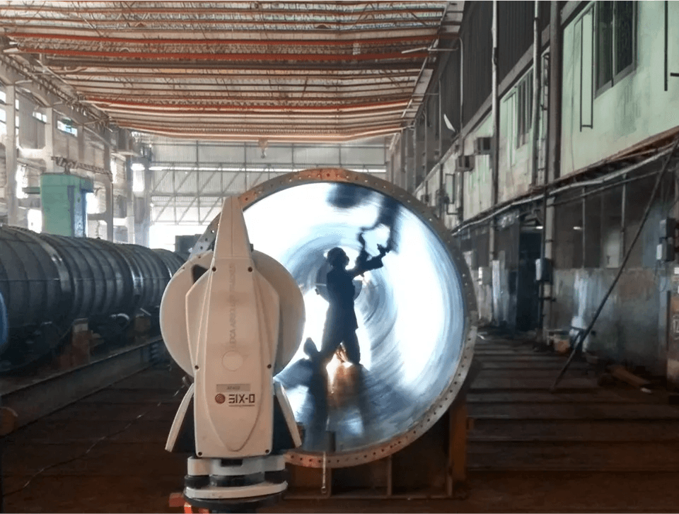 a sculpture of a toilet and a ball on a pedestal