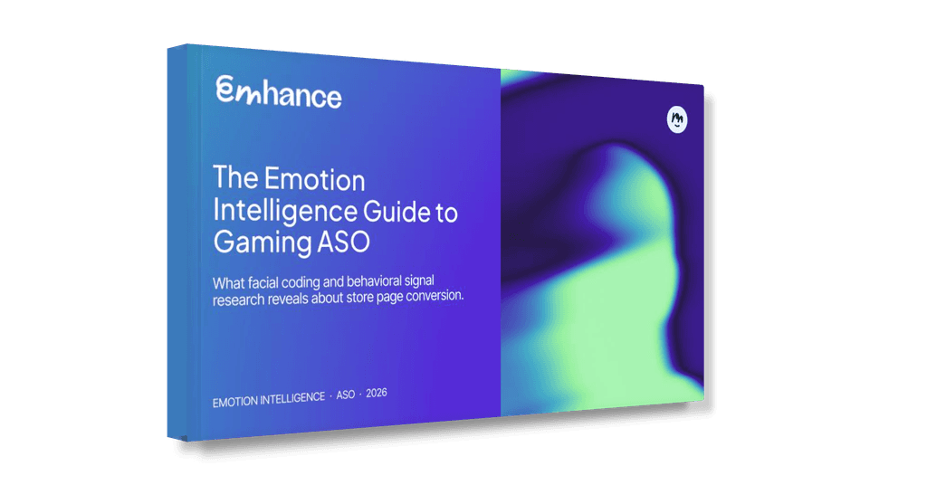 A 3D-styled graphic of an eBook titled "The Emotion Intelligence Guide to Gaming ASO" by Enhance. The cover features a gradient of blue and purple with an abstract, fluid green shape on the right side. Subtext reads: "What facial coding and behavioral signal research reveals about store page conversion." The bottom left corner lists the categories "EMOTION INTELLIGENCE • ASO • 2026."