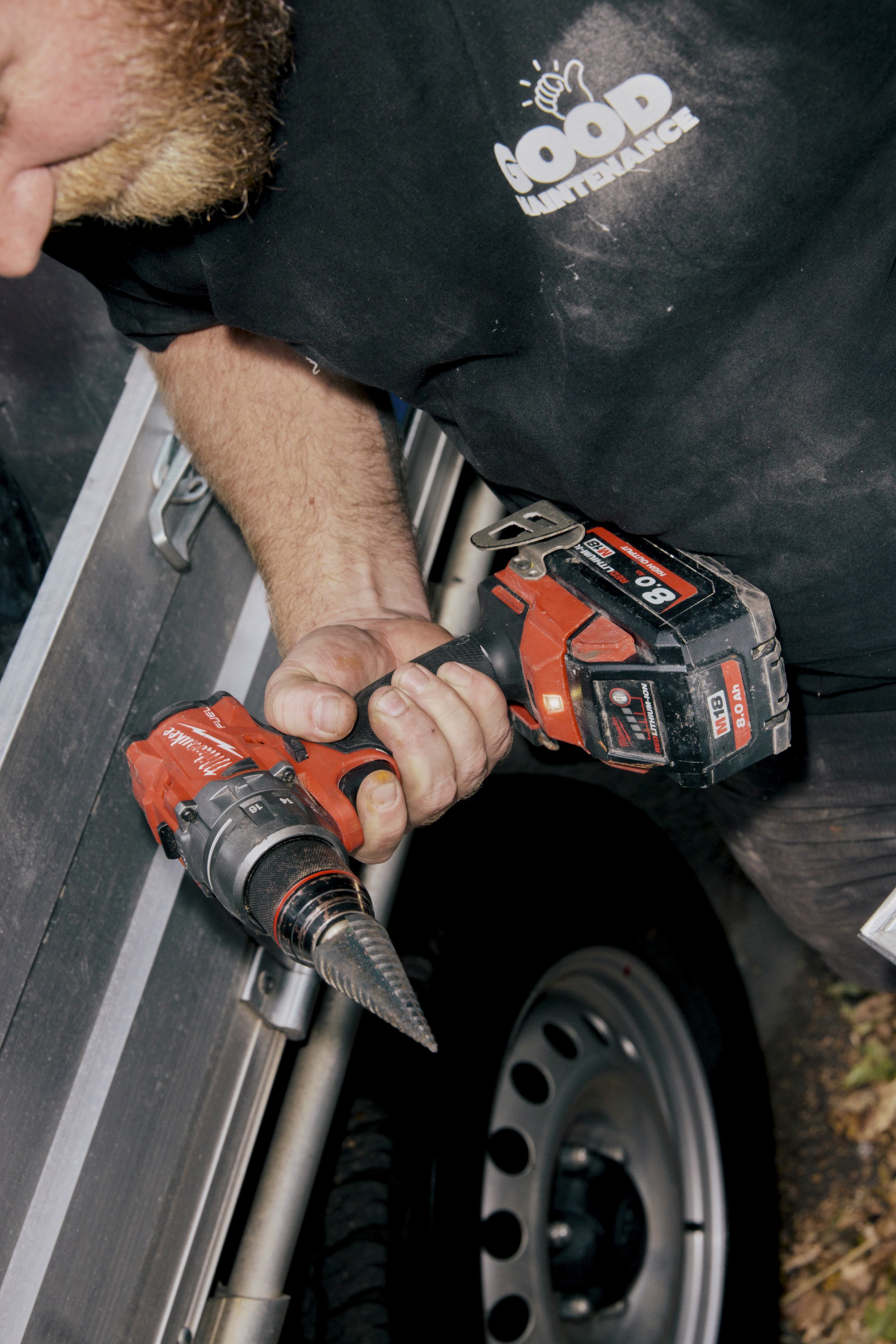 Team Member weaing a Late Night Servicing shirt