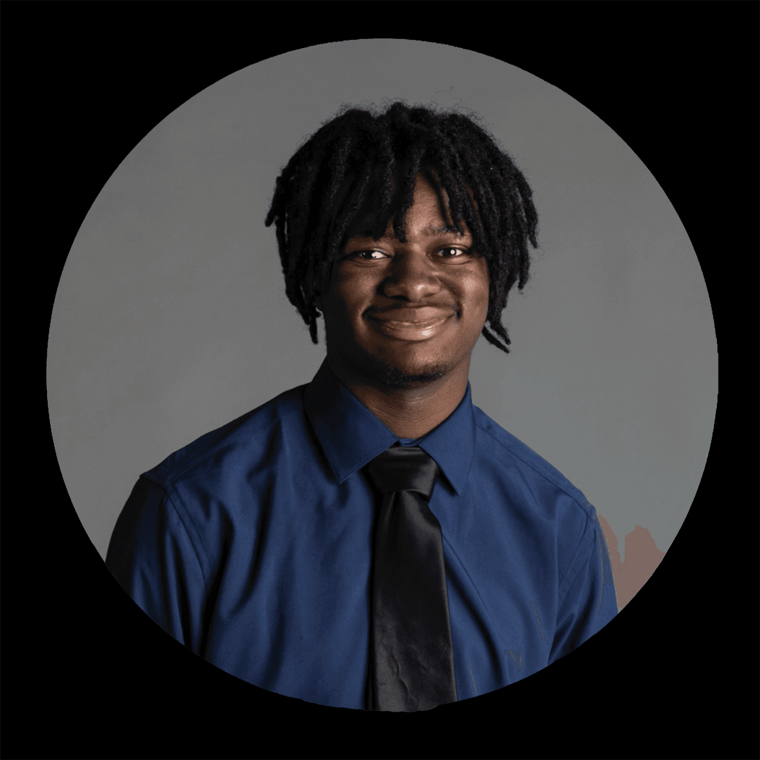 woman in black crew neck t-shirt wearing brown framed eyeglasses standing on rocky shore during