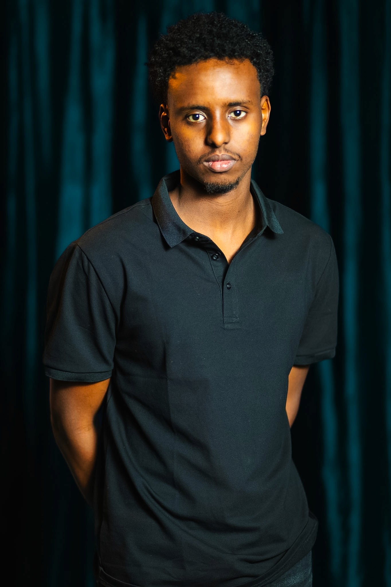 Team member looking towards camera