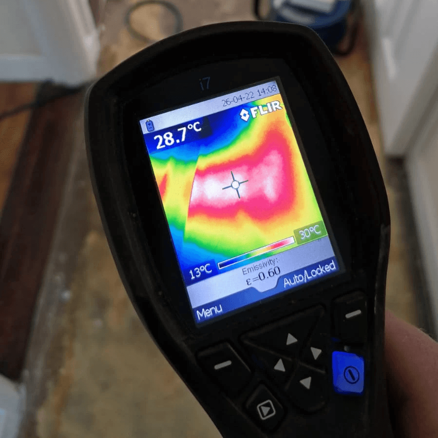 a person holding a cell phone in their hand