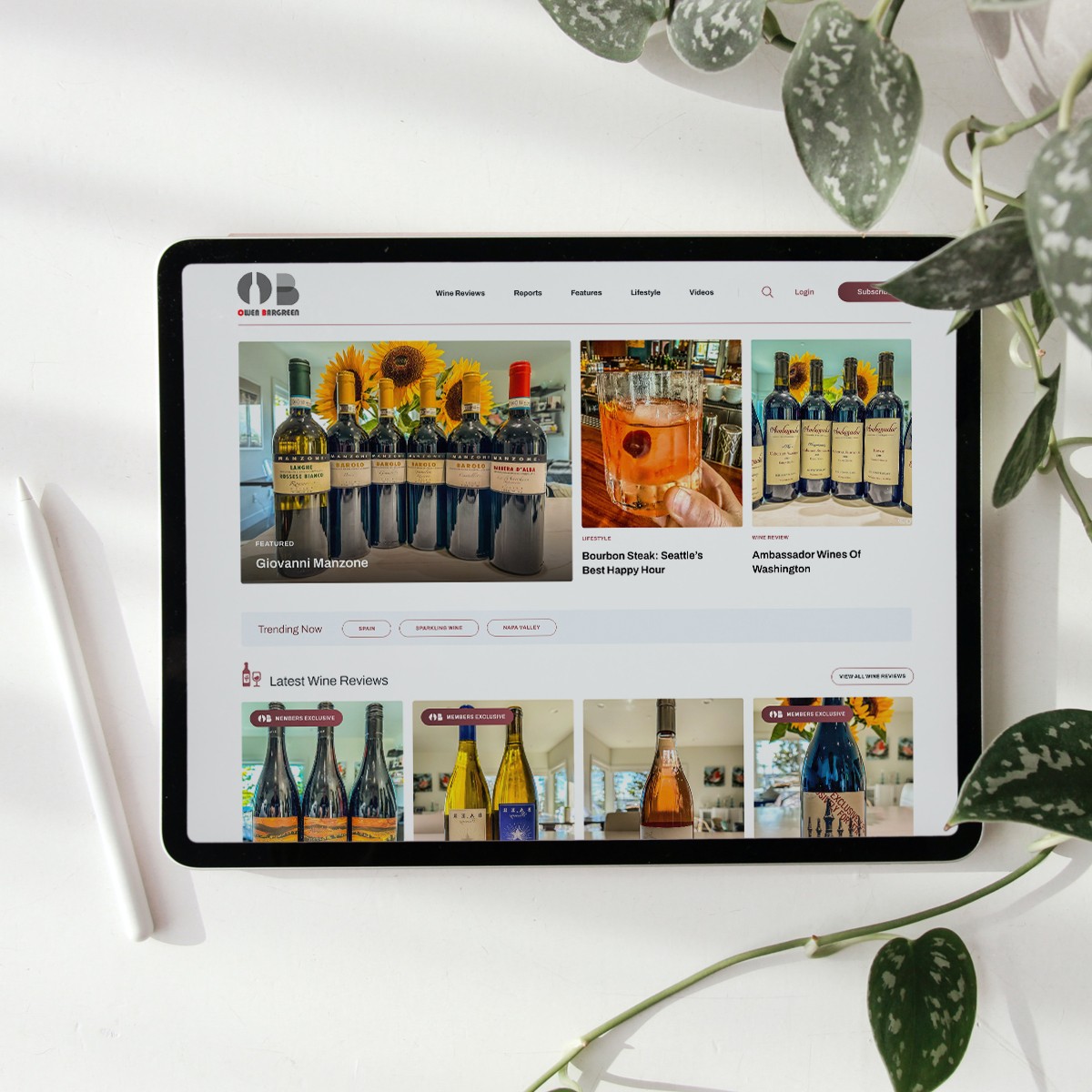 Tablet mockup of the wine review platform homepage, showing featured wines and reviews.