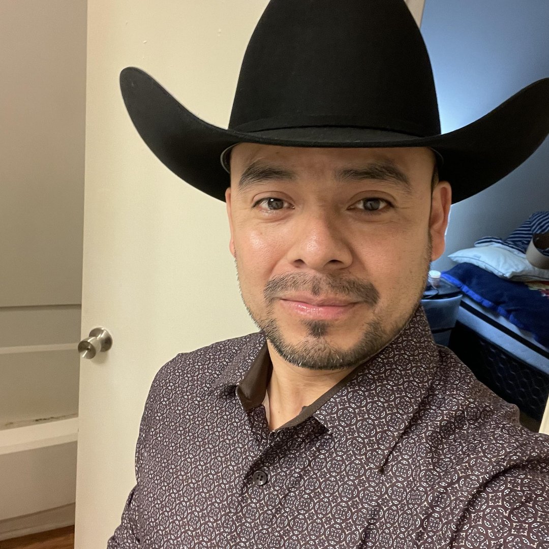 a black porsche with a gray background