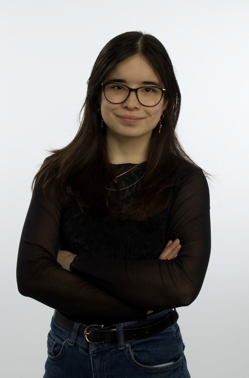 A young girl smiling