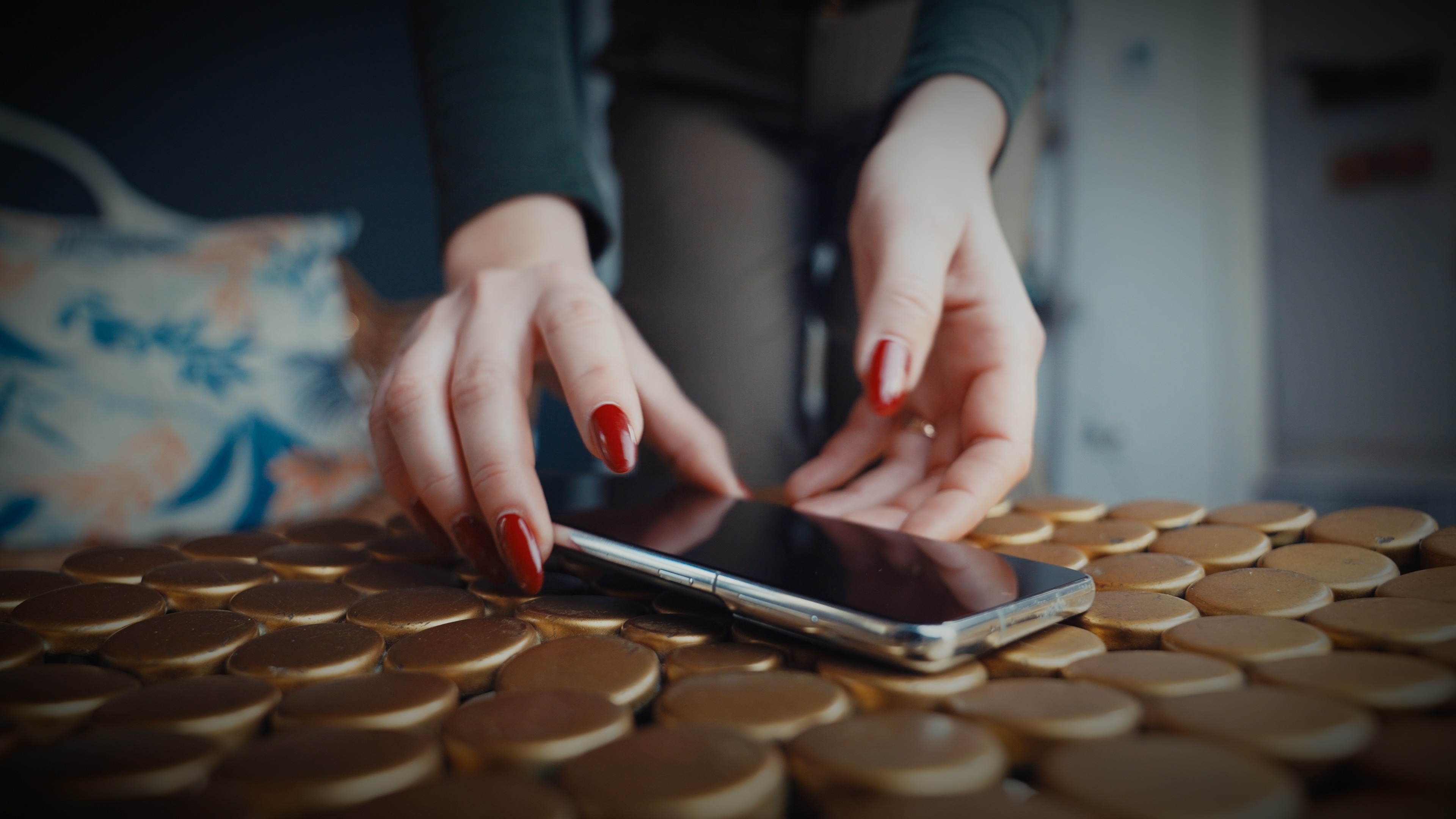 A woman in a helmet with a light trail, suggesting movement or speed in a dynamic outdoor setting.