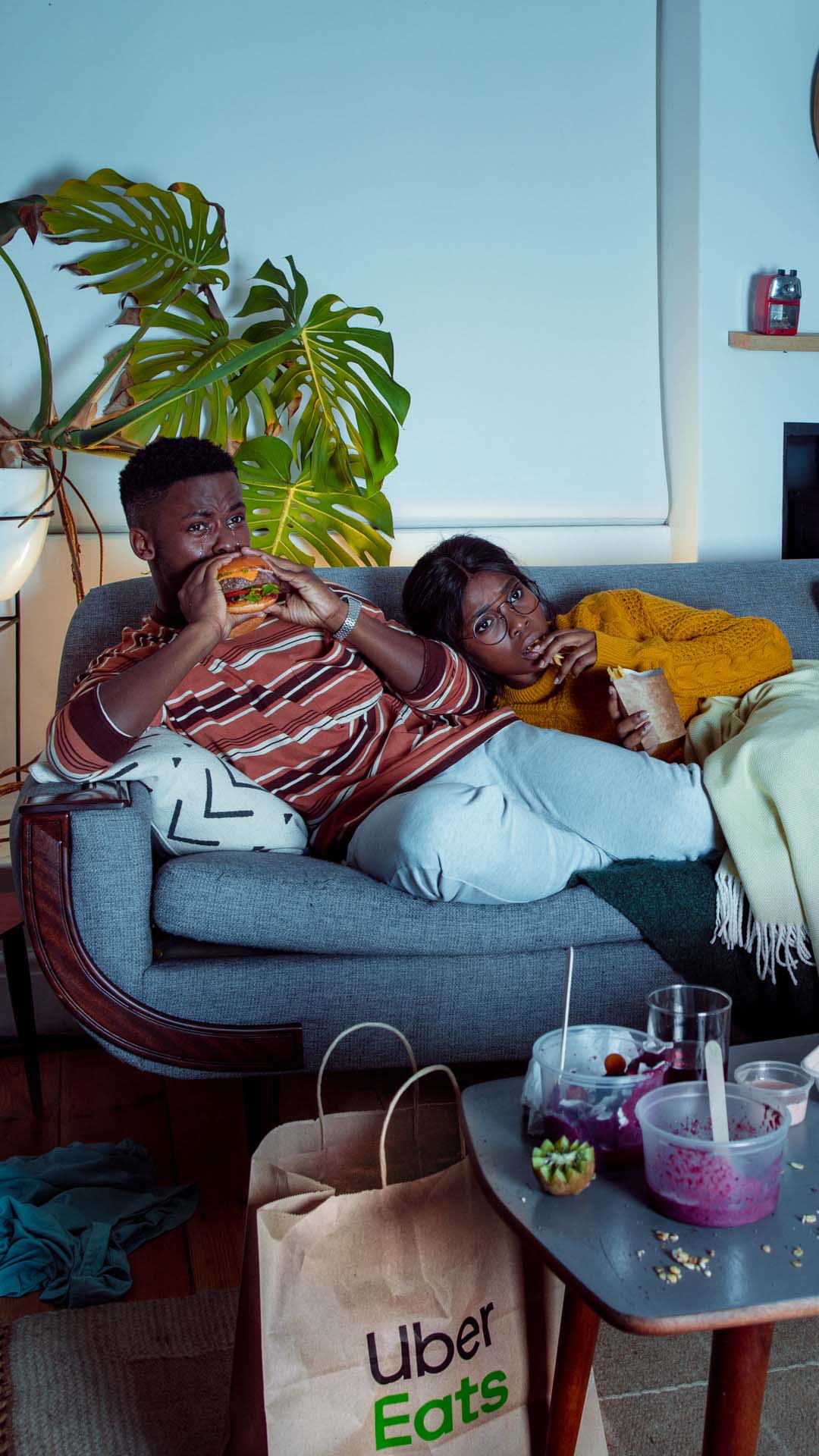 couple eating food and watching movie